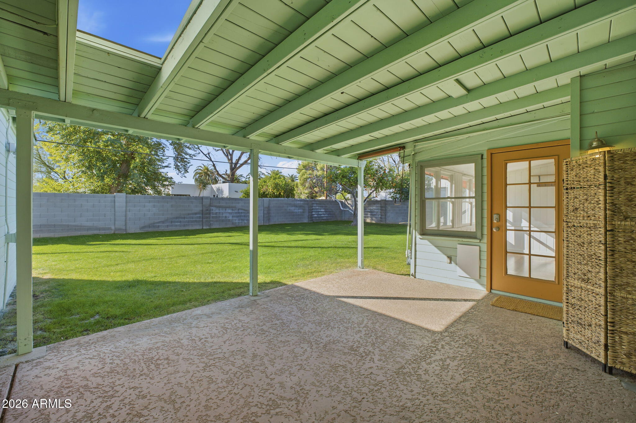 427 East Oregon Avenue Phoenix, AZ 85012 - Photo 20 of 32 a view of a house with a backyard