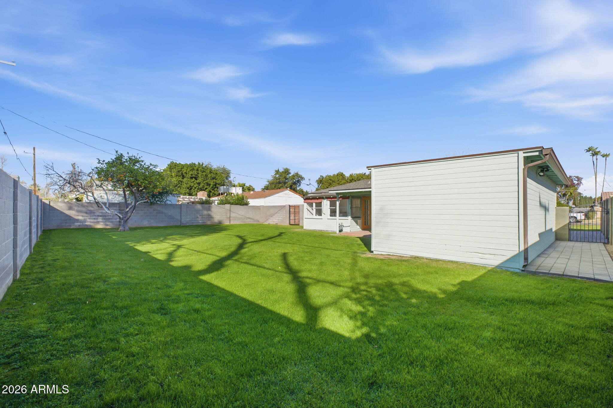 427 East Oregon Avenue Phoenix, AZ 85012 - Photo 23 of 32 a view of an house with backyard space and garden