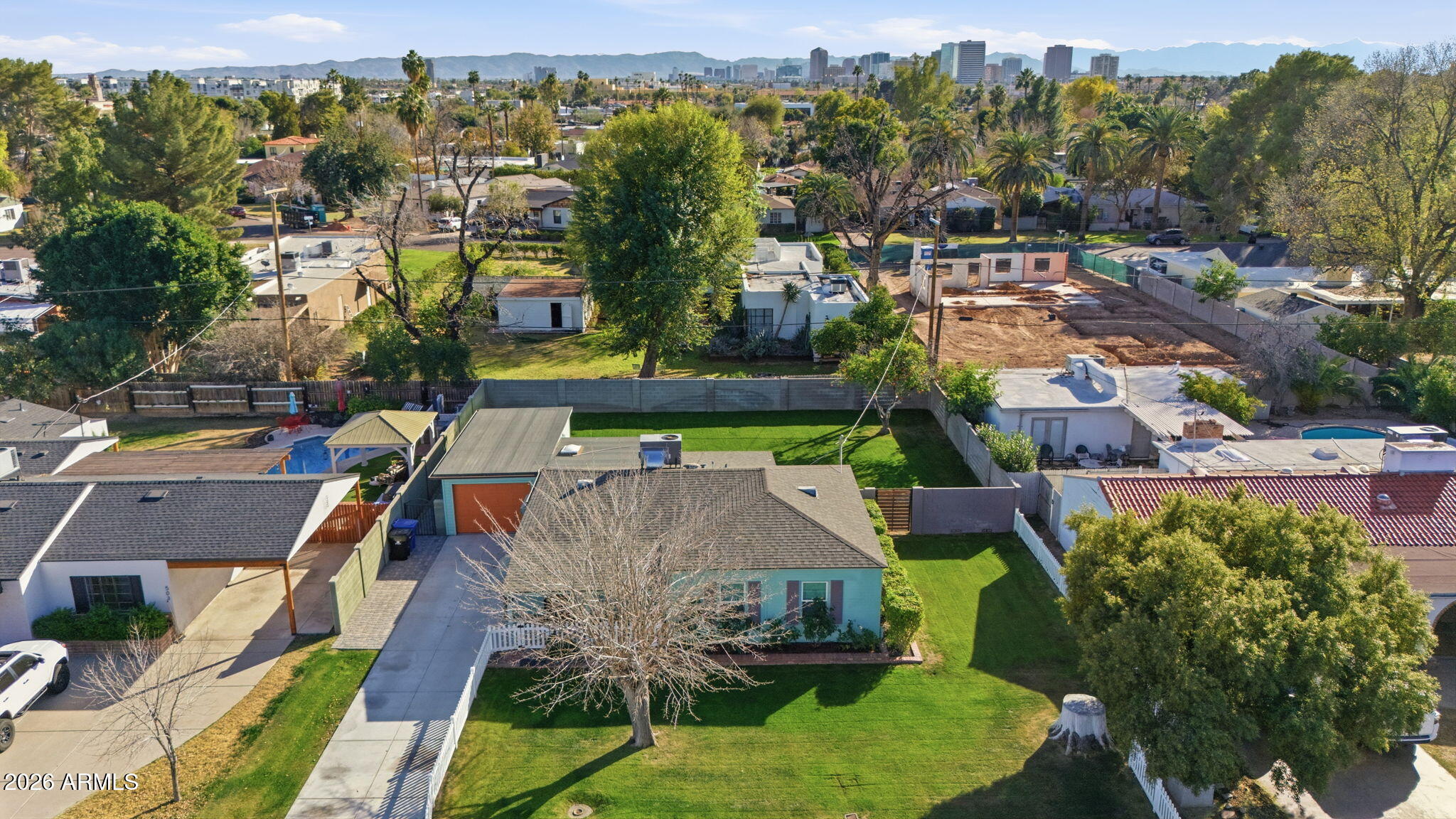 427 East Oregon Avenue Phoenix, AZ 85012 - Photo 26 of 32 an aerial view of multiple houses with yard