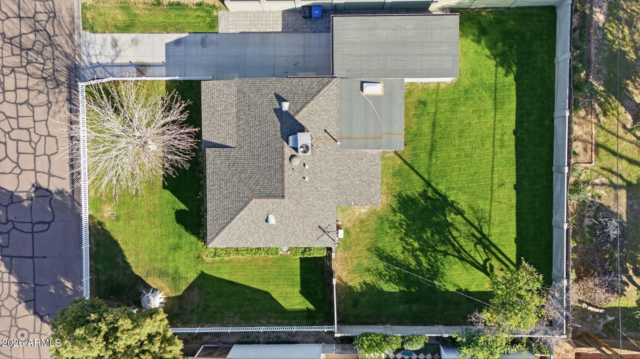 427 East Oregon Avenue Phoenix, AZ 85012 - Photo 27 of 32 an aerial view of a house with a garden