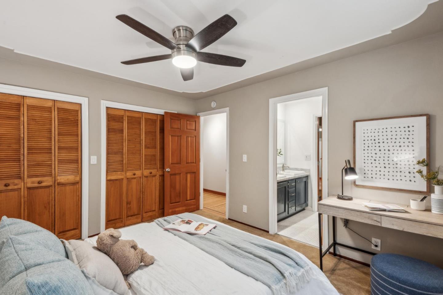 13872 Silver Sky Way Woodside, CA 94062 - Photo 49 of 78 a bedroom with a bed and a large window