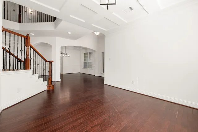 a view of an entryway with wooden floor