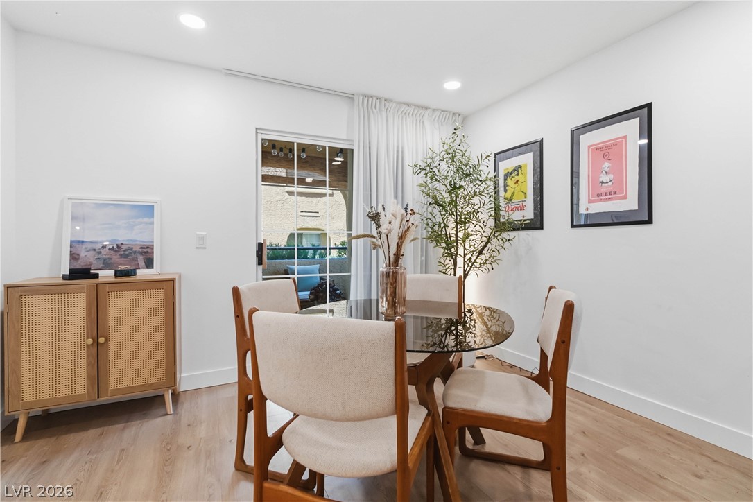 7950 West Flamingo Road, Unit 1180 Las Vegas, NV 89147 - Photo 8 of 26 Natural light streams into this intimate dining area, perfect for daily meals and entertaining.