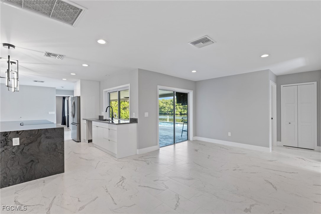 432 Seaworthy Road North Fort Myers, FL 33903 - Photo 19 of 28 a view of an empty room and window