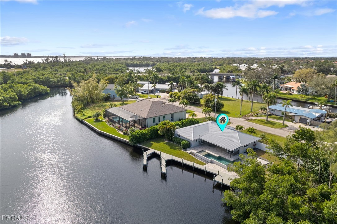 432 Seaworthy Road North Fort Myers, FL 33903 - Photo 23 of 28 an aerial view of a city with lawn chairs