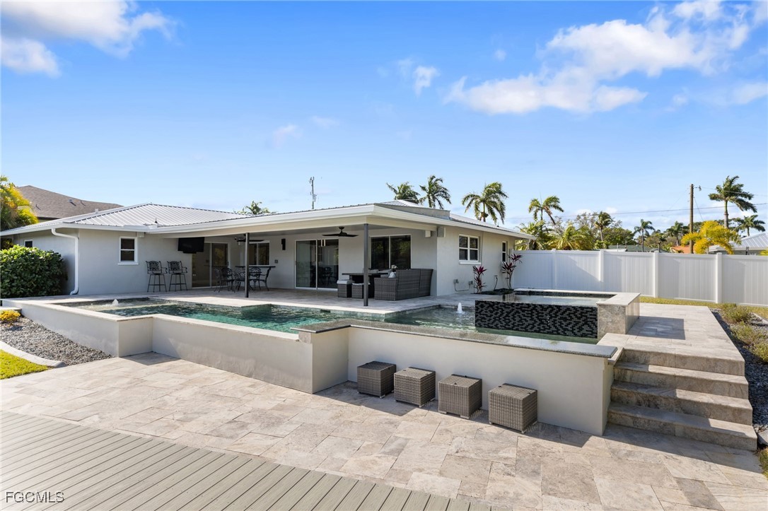 432 Seaworthy Road North Fort Myers, FL 33903 - Photo 27 of 28 a view of a house with swimming pool and sitting area