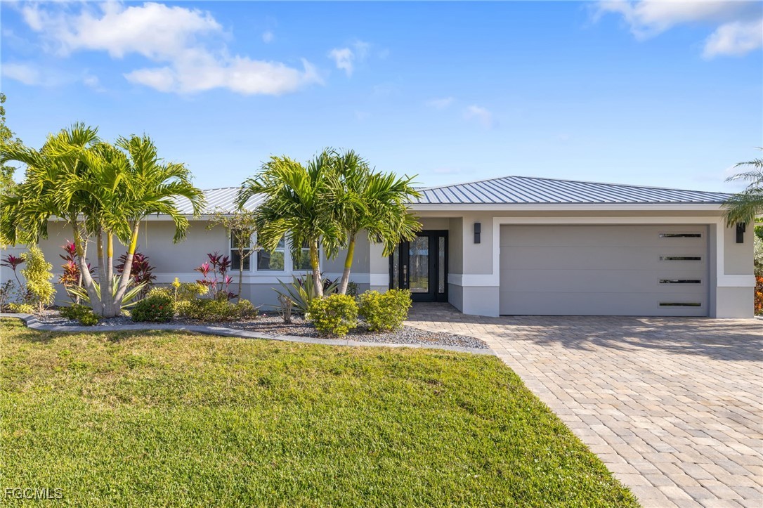 432 Seaworthy Road North Fort Myers, FL 33903 - Photo 6 of 28 a front view of a house with a yard