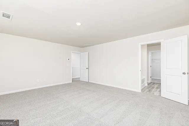 an empty room with an entryway