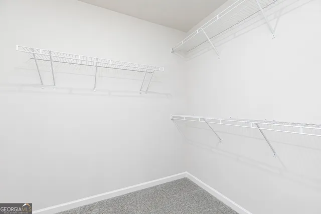 a view of a room with racks on the wall