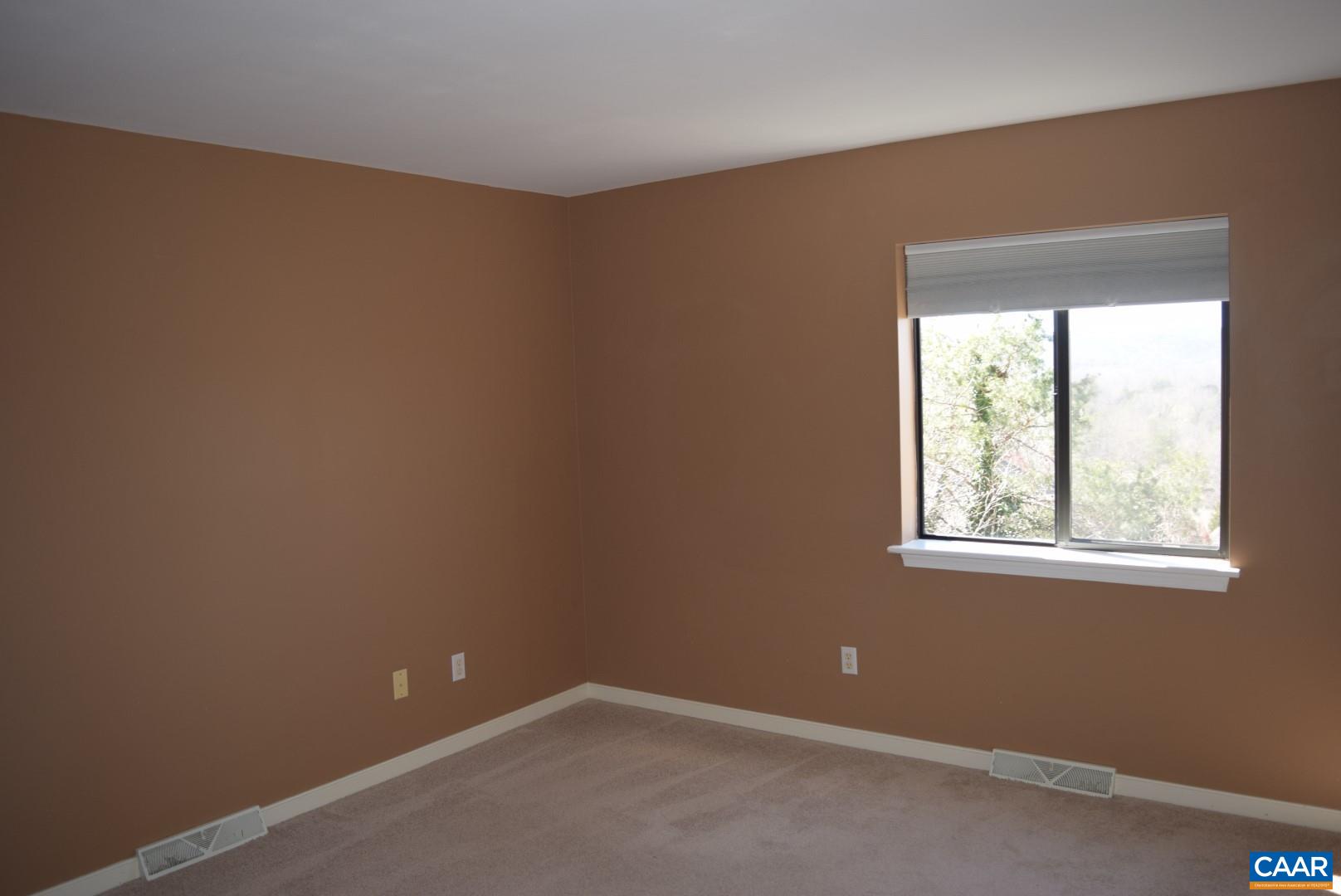 1292 Millpond Road Charlottesville, VA 22902 - Photo 16 of 42 an empty room with a window