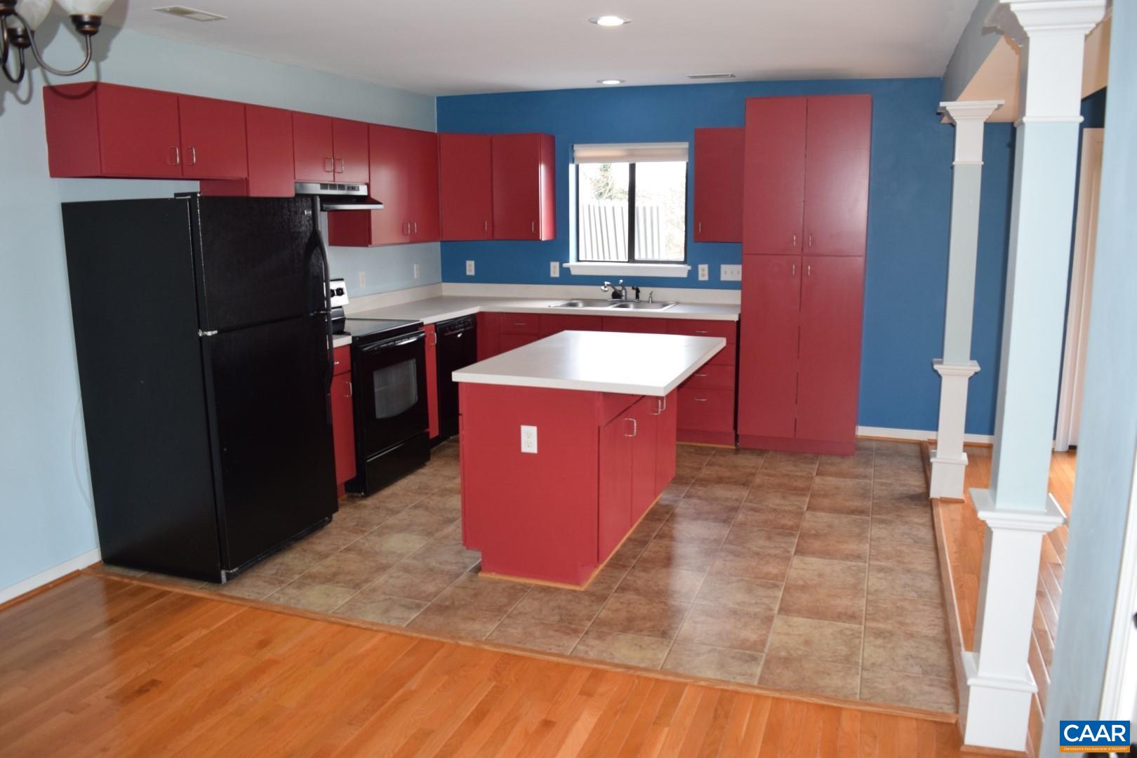1292 Millpond Road Charlottesville, VA 22902 - Photo 6 of 42 a kitchen with refrigerator and window