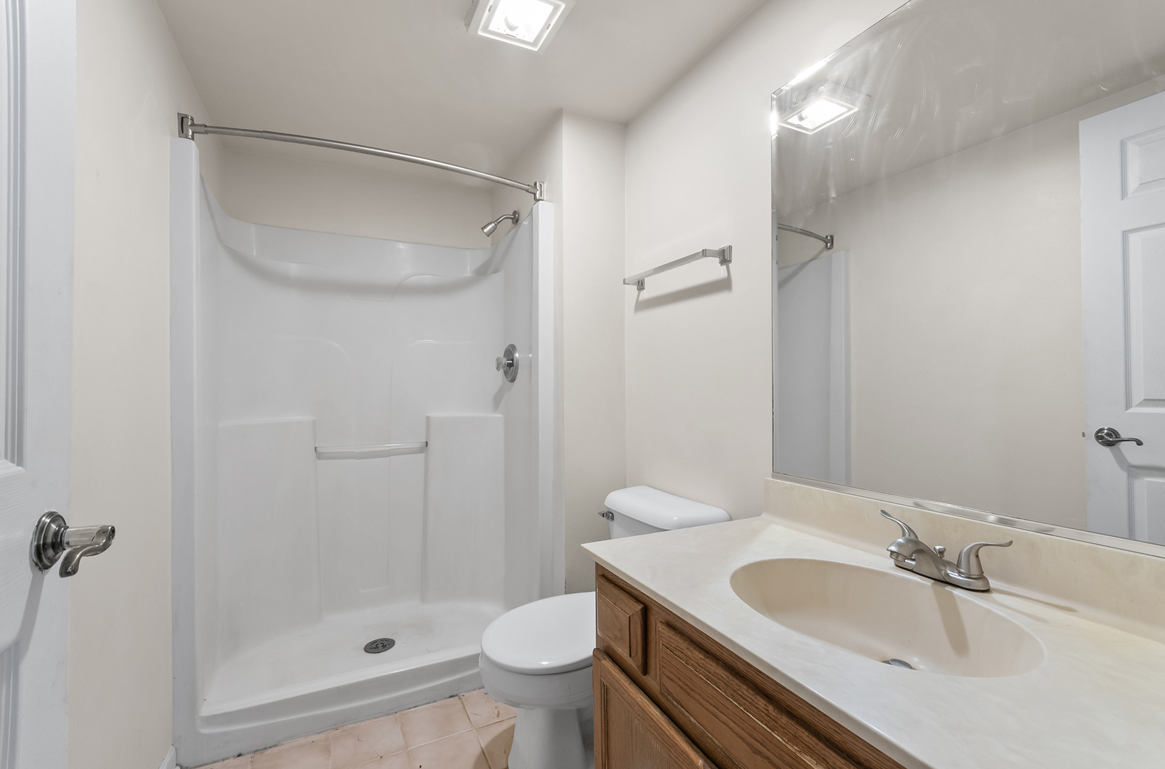 18302 Robin Lane, Unit D1 Homewood, IL 60430 - Photo 14 of 22 a bathroom with a granite countertop sink toilet and shower