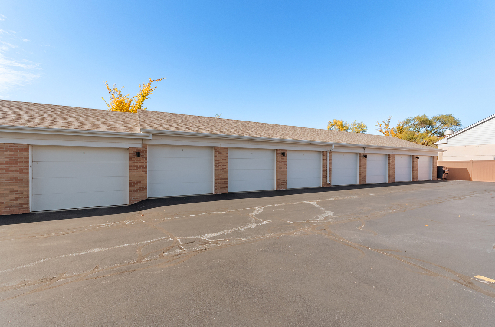 18302 Robin Lane, Unit D1 Homewood, IL 60430 - Photo 22 of 22 a front view of a house with a yard and garage