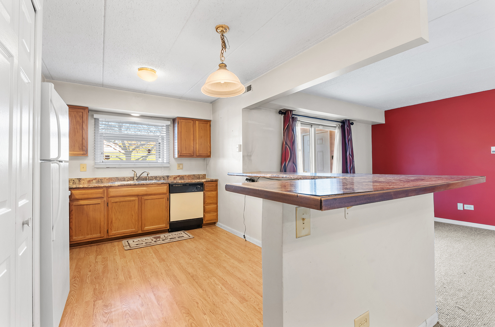 18302 Robin Lane, Unit D1 Homewood, IL 60430 - Photo 7 of 22 a large kitchen with granite countertop a stove and a sink