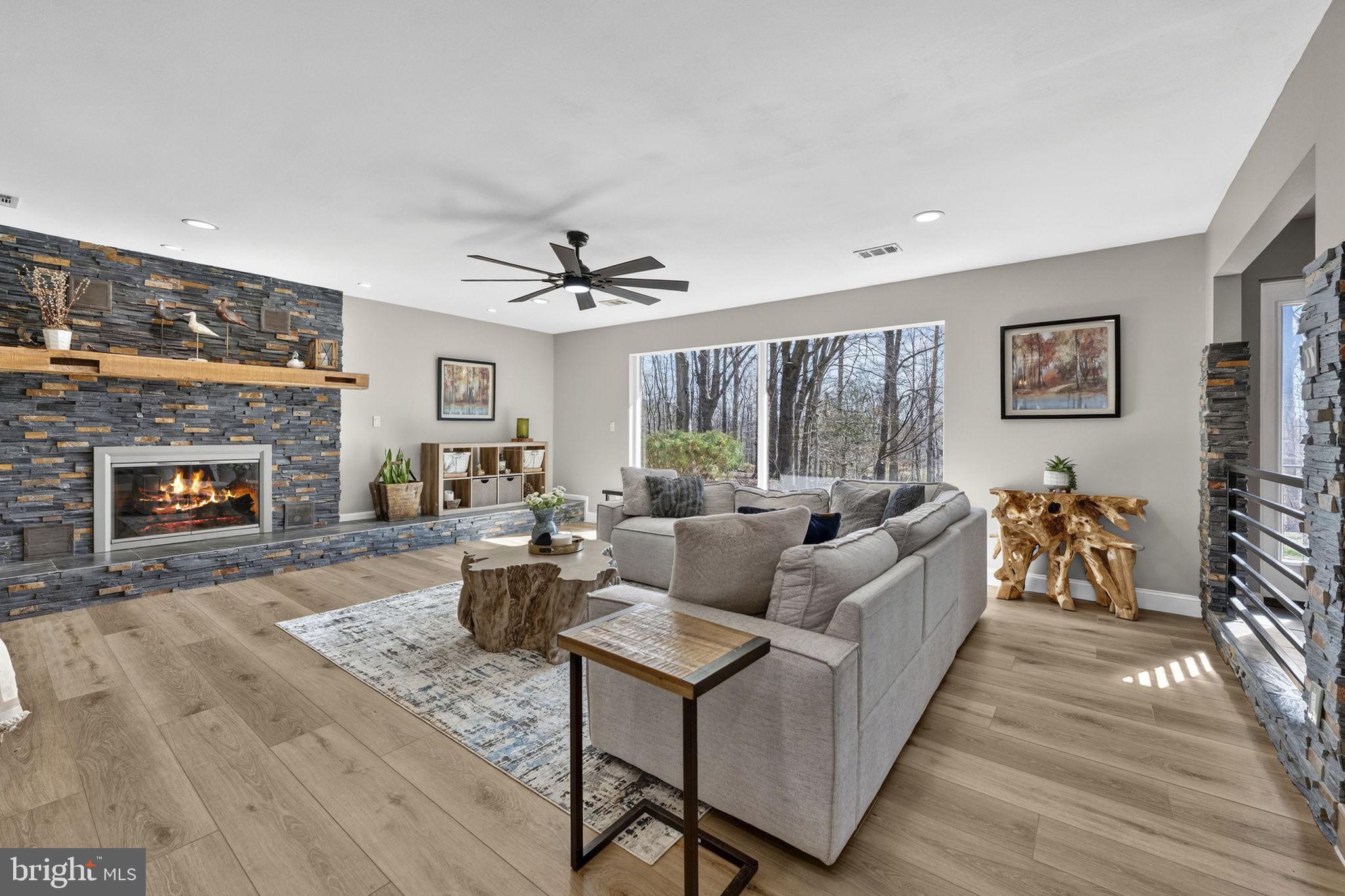 7427 Maple Branch Road Clifton, VA 20124 - Photo 14 of 100 Living Room with Cozy Wood-Burning Fireplace