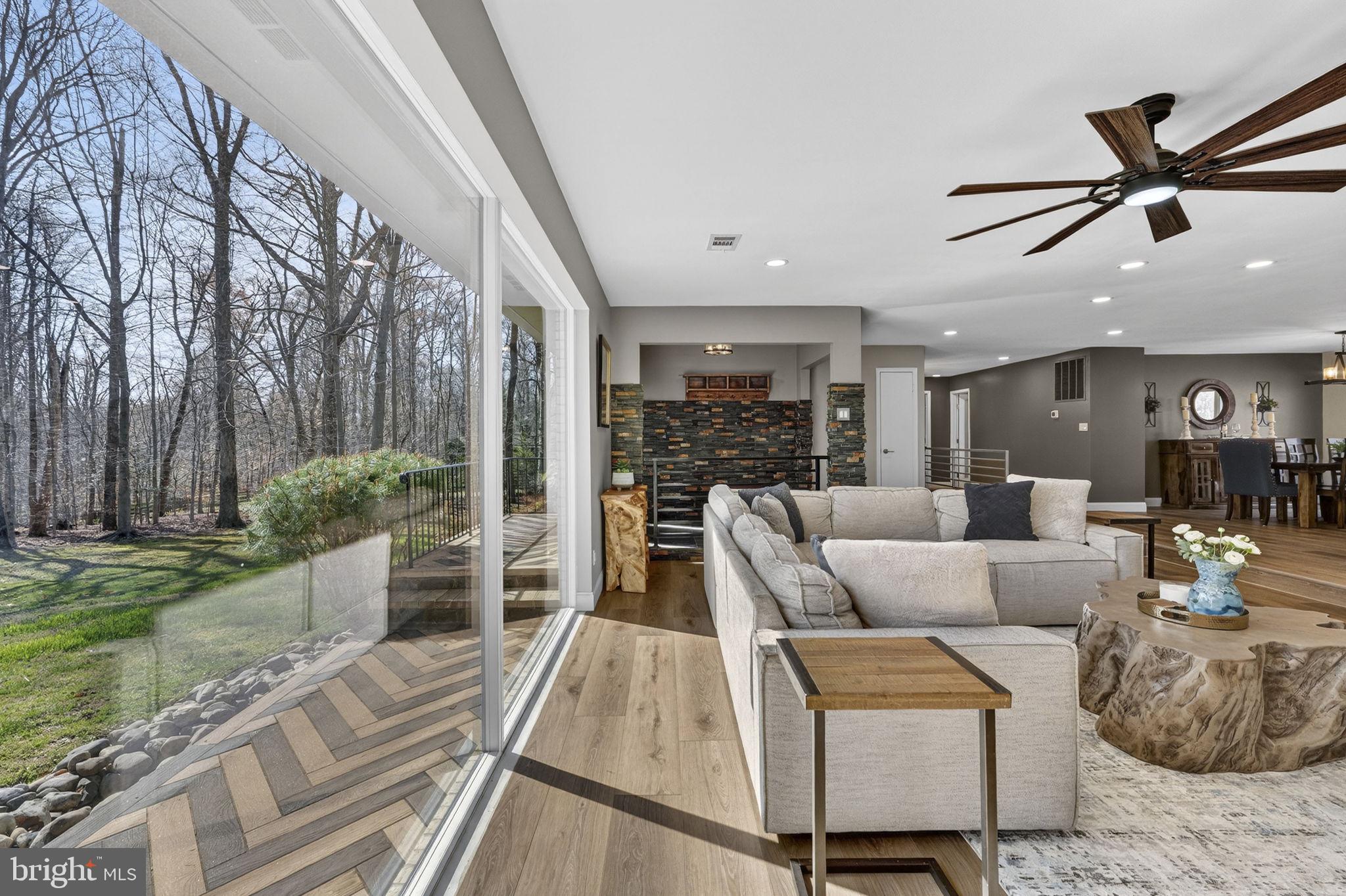 7427 Maple Branch Road Clifton, VA 20124 - Photo 16 of 100 Living Room with Floor to Ceiling Sunlit Windows