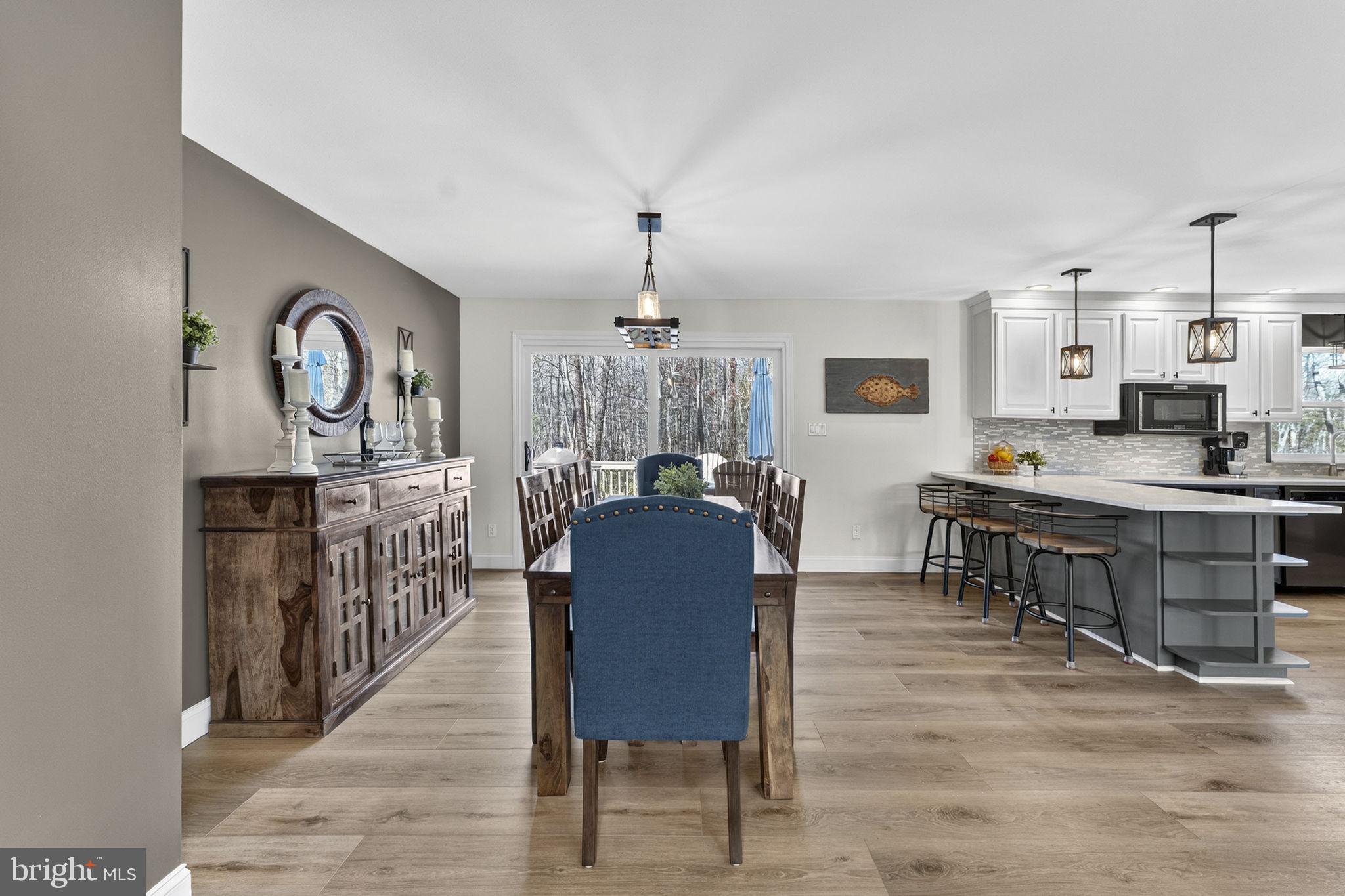 7427 Maple Branch Road Clifton, VA 20124 - Photo 19 of 100 Dining Room with Sliding Glass Door to Deck