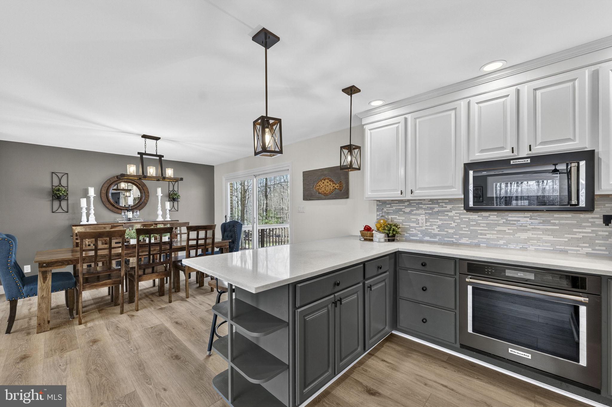 7427 Maple Branch Road Clifton, VA 20124 - Photo 23 of 100 Gourmet Kitchen Opens to Dining Room