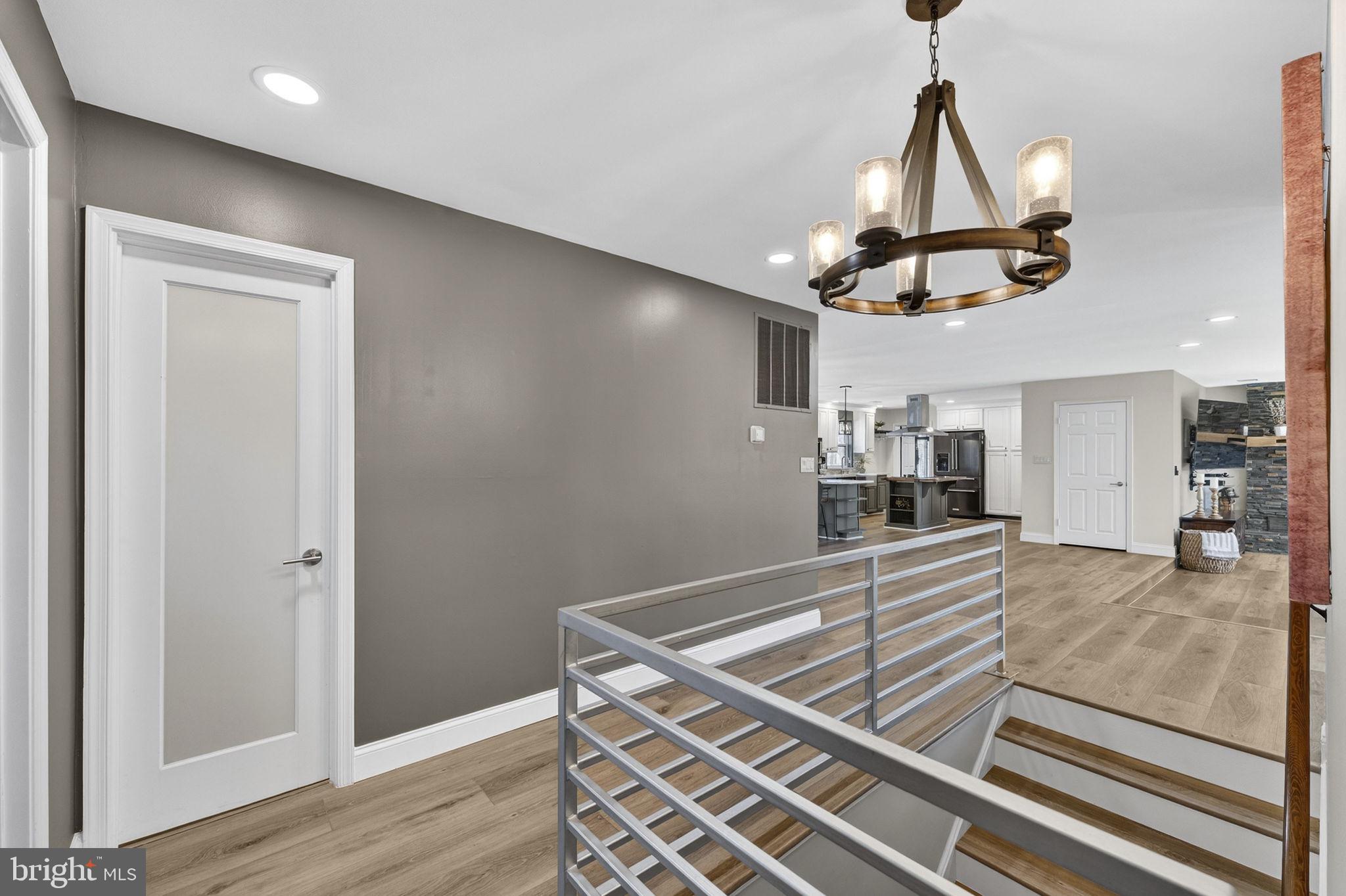 7427 Maple Branch Road Clifton, VA 20124 - Photo 50 of 100 Main Hallway Opens to Hall Bath