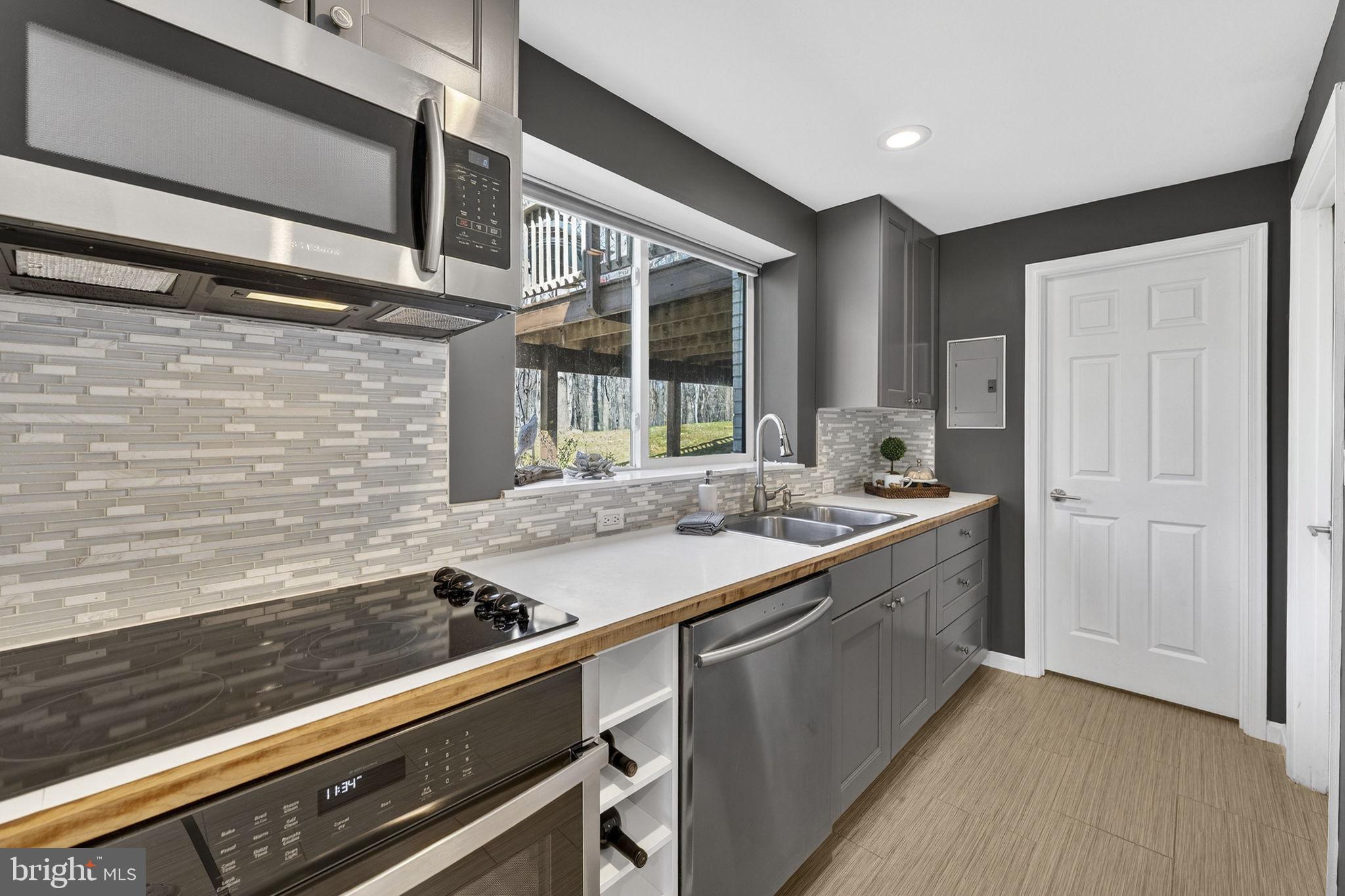 7427 Maple Branch Road Clifton, VA 20124 - Photo 67 of 100 2nd Kitchen Opens to 2nd LL Full Bath