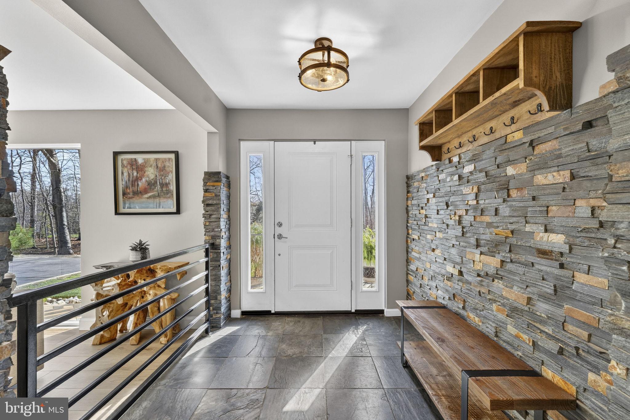 7427 Maple Branch Road Clifton, VA 20124 - Photo 7 of 100 Inviting Foyer with Stone Flooring