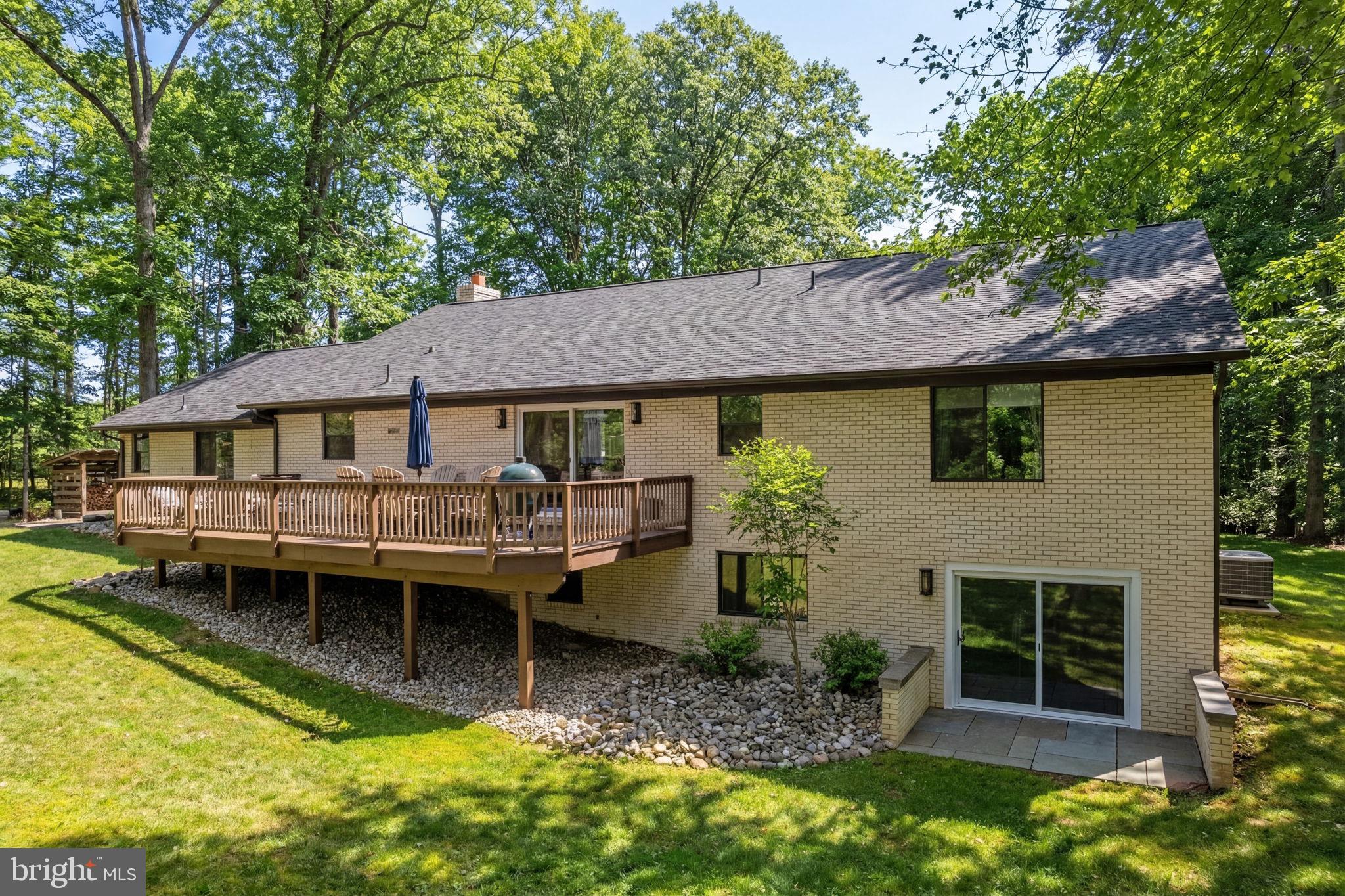 7427 Maple Branch Road Clifton, VA 20124 - Photo 71 of 100 Sunlit Walk-Out Elevation Opens to Finished LL