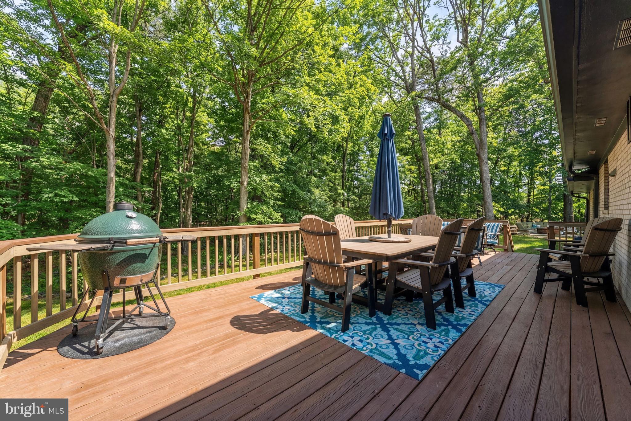7427 Maple Branch Road Clifton, VA 20124 - Photo 74 of 100 Spacious Deck Opens to Separate Patio with Firepit