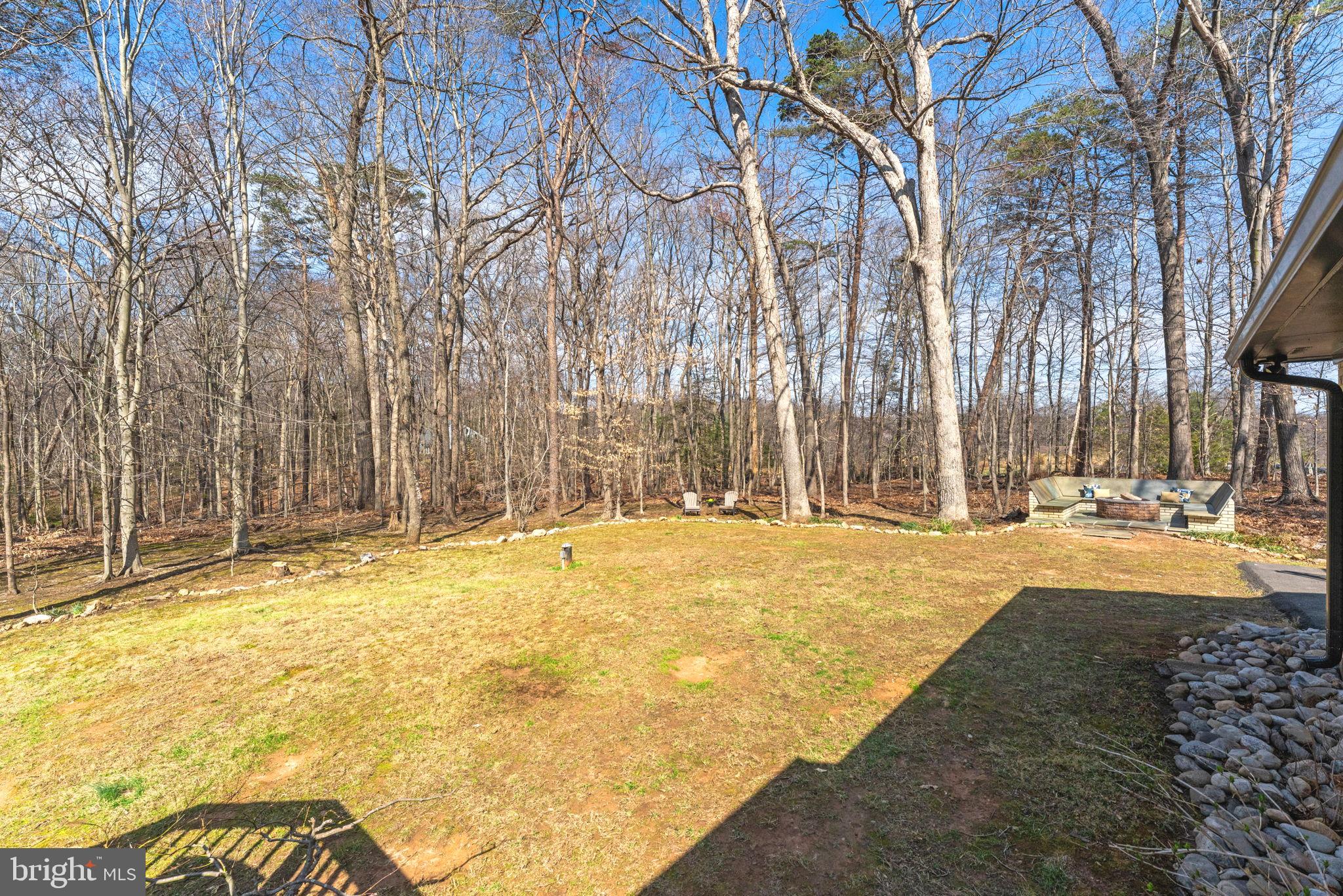 7427 Maple Branch Road Clifton, VA 20124 - Photo 75 of 100 View of Private Treed Backyard/Fire Pit from Deck