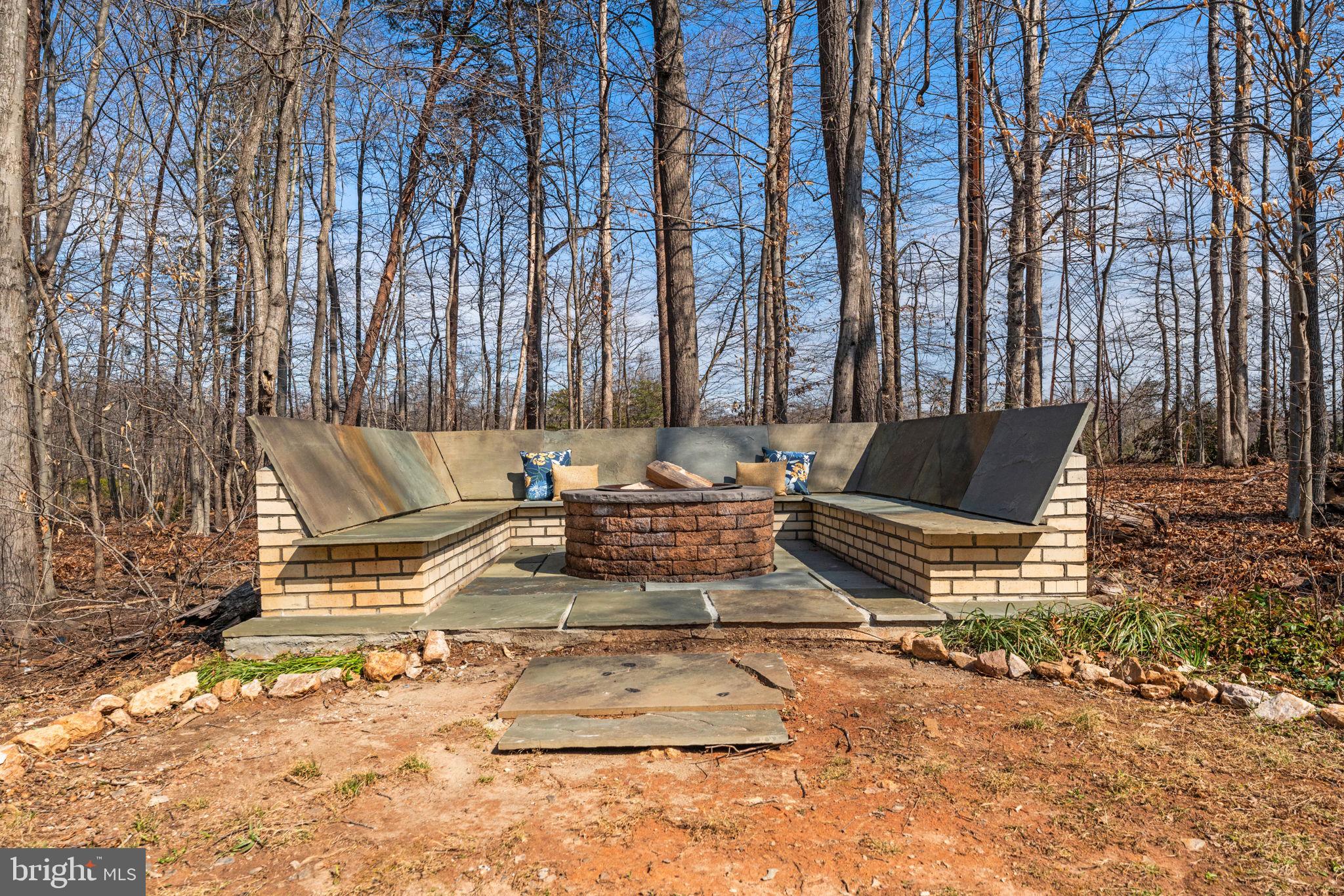 7427 Maple Branch Road Clifton, VA 20124 - Photo 76 of 100 Custom Patio with Built-In Firepit & Seating