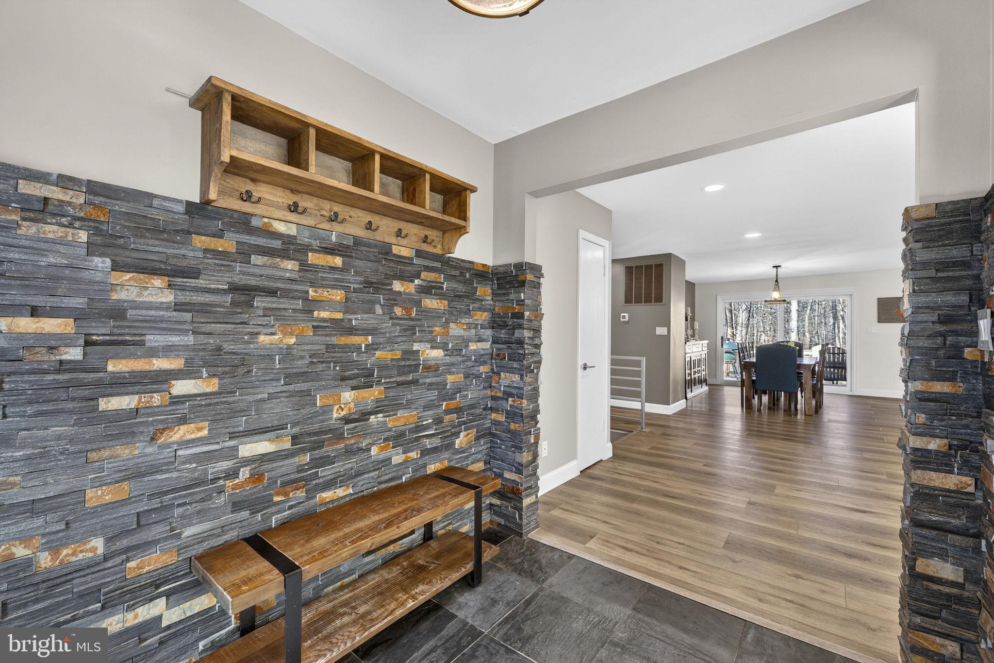 7427 Maple Branch Road Clifton, VA 20124 - Photo 8 of 100 Inviting Foyer with Built-In Shelving & Bench