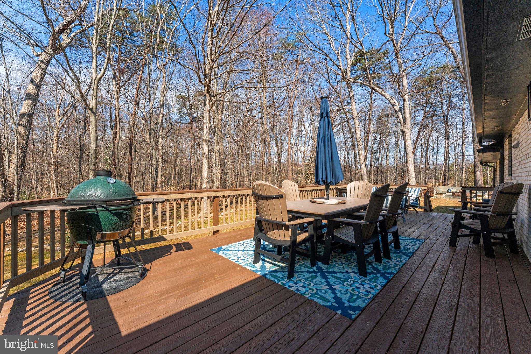7427 Maple Branch Road Clifton, VA 20124 - Photo 91 of 100 Spacious Deck Opens to Separate Patio with Firepit
