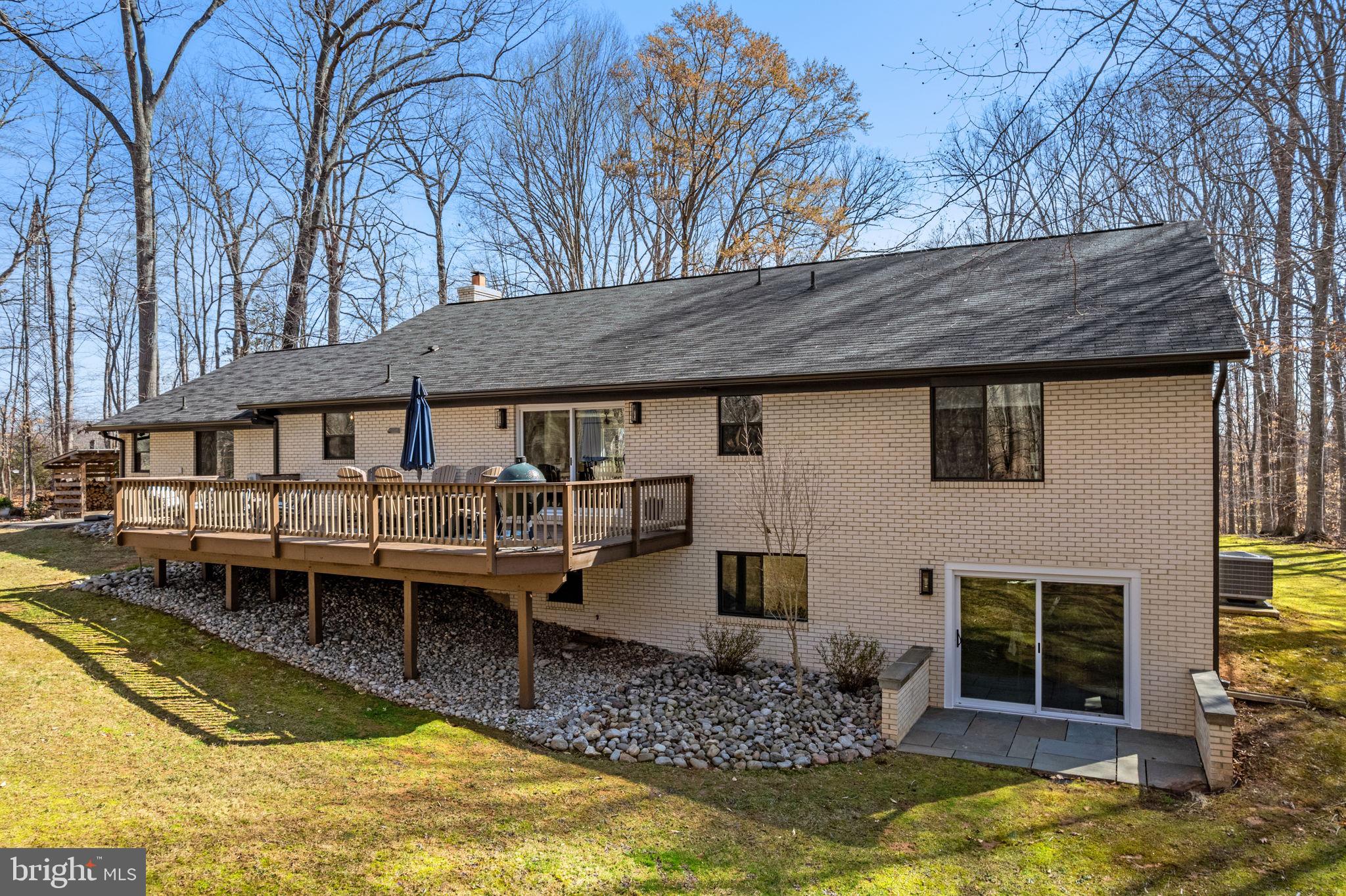 7427 Maple Branch Road Clifton, VA 20124 - Photo 92 of 100 Sunlit Walk-Out Elevation Opens to Finished LL