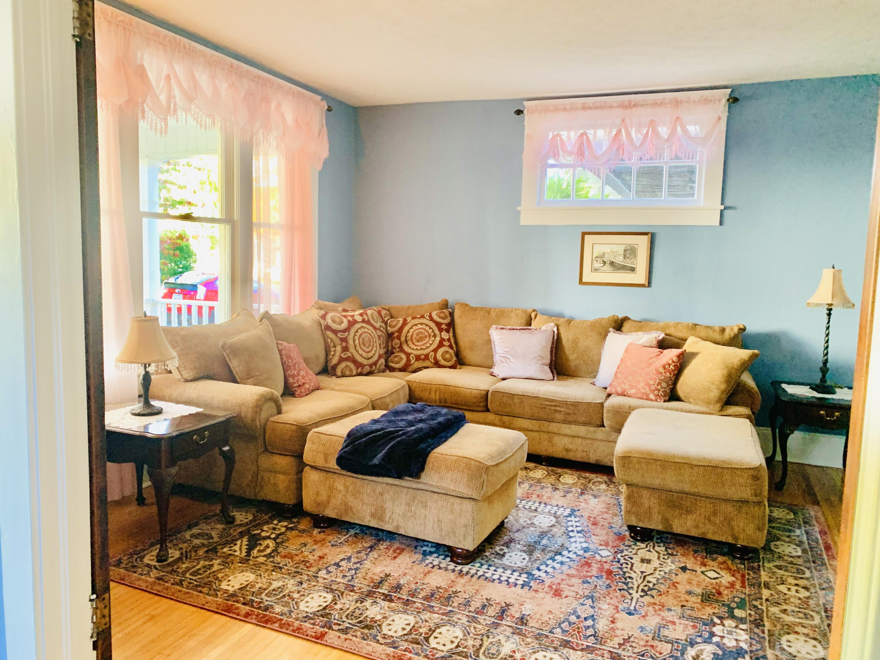 709 McCormick Boulevard Clifton Forge, VA 24422 - Photo 12 of 74 a living room with furniture and a large window