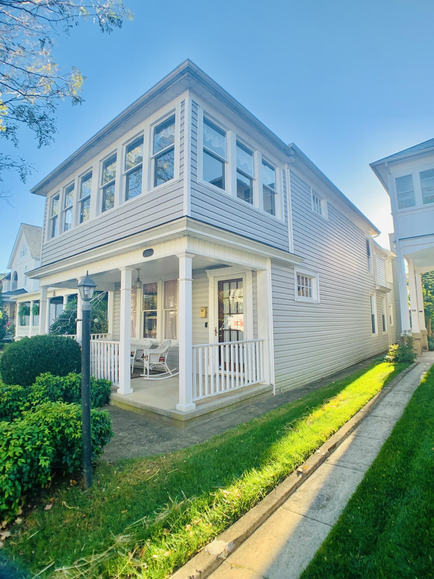 709 McCormick Boulevard Clifton Forge, VA 24422 - Photo 3 of 74 a view of a house with a yard and a chair