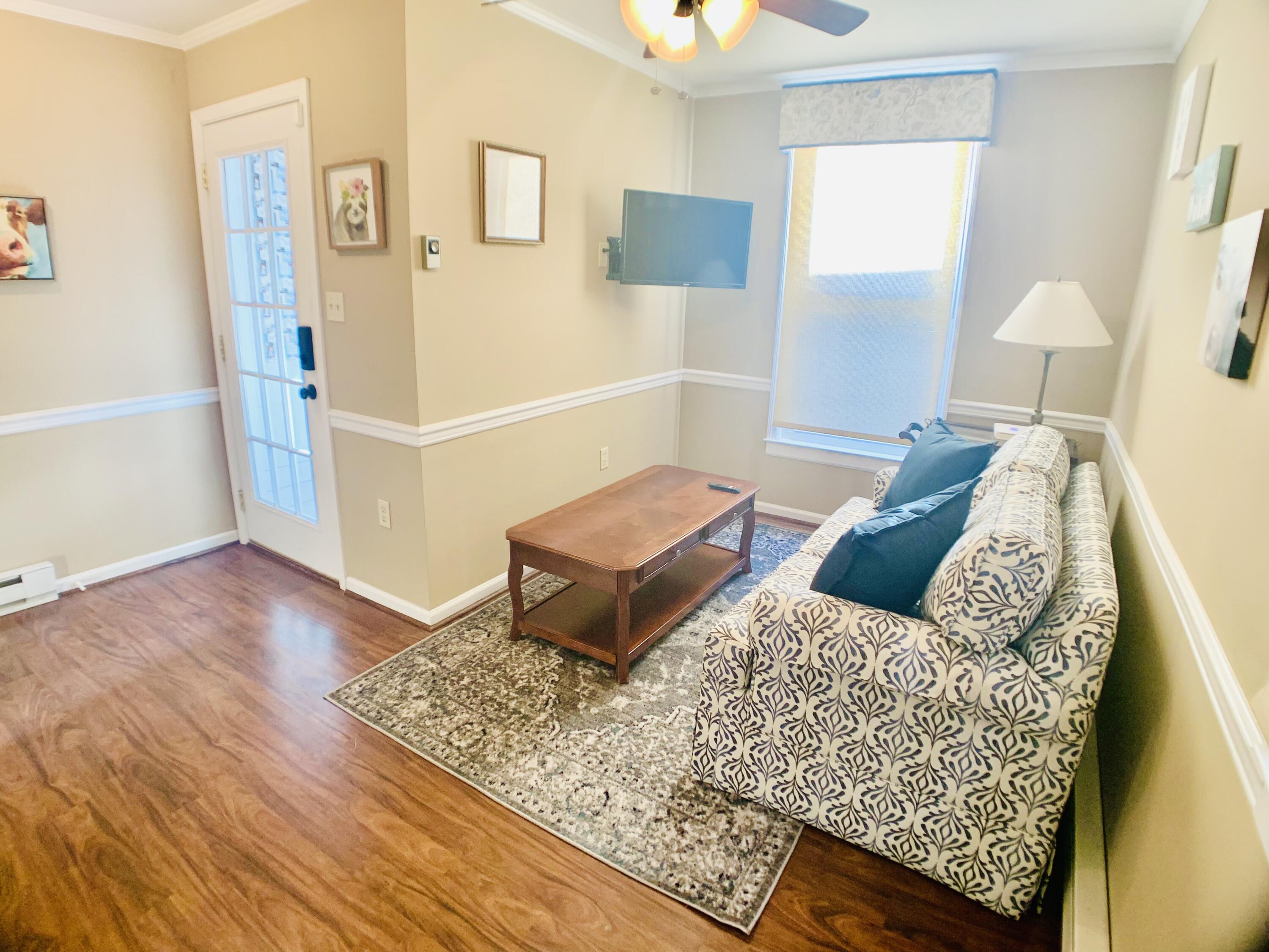 709 McCormick Boulevard Clifton Forge, VA 24422 - Photo 27 of 74 a living room with furniture and wooden floor