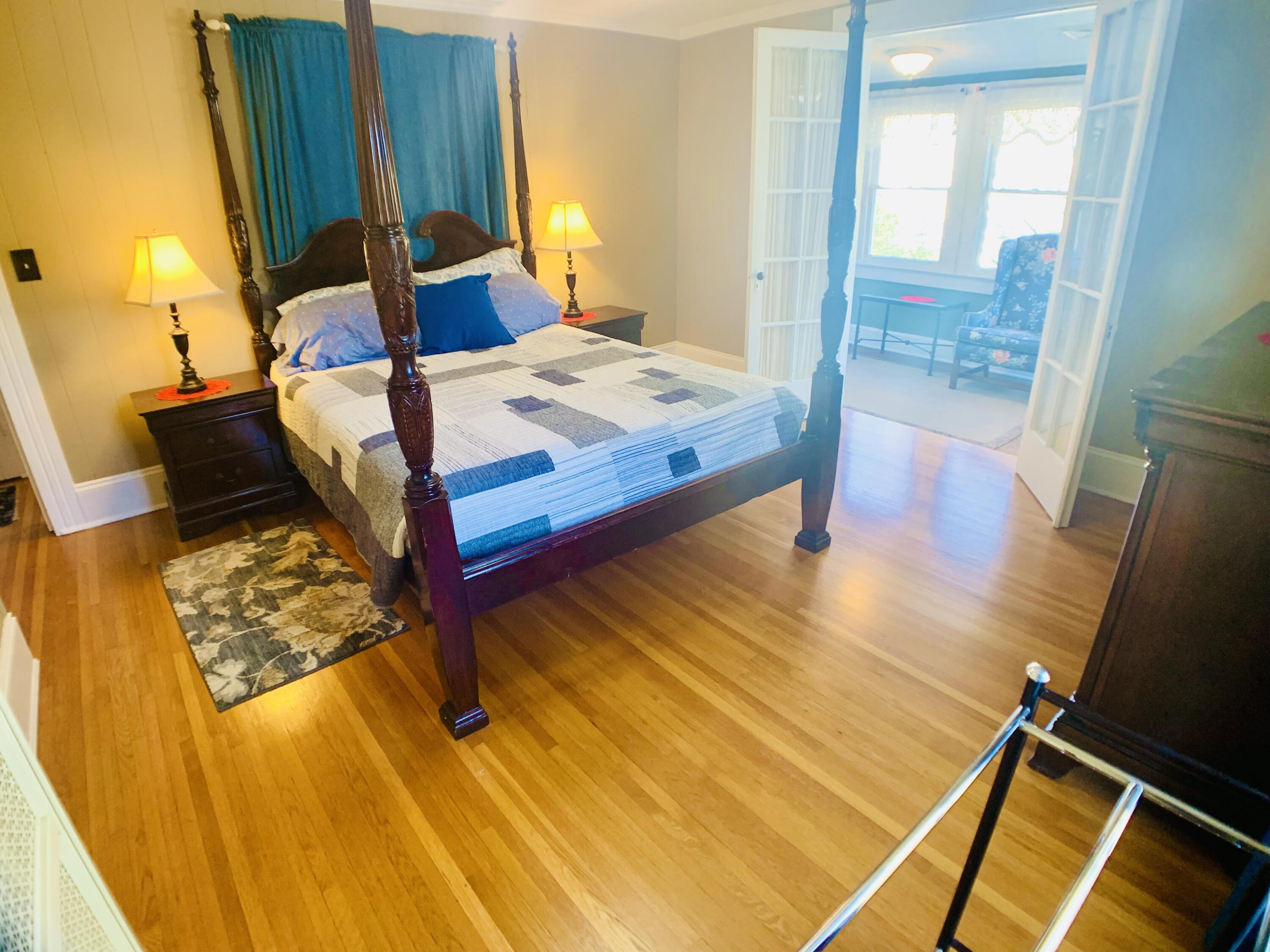 709 McCormick Boulevard Clifton Forge, VA 24422 - Photo 50 of 74 a bedroom with a bed and wooden floor