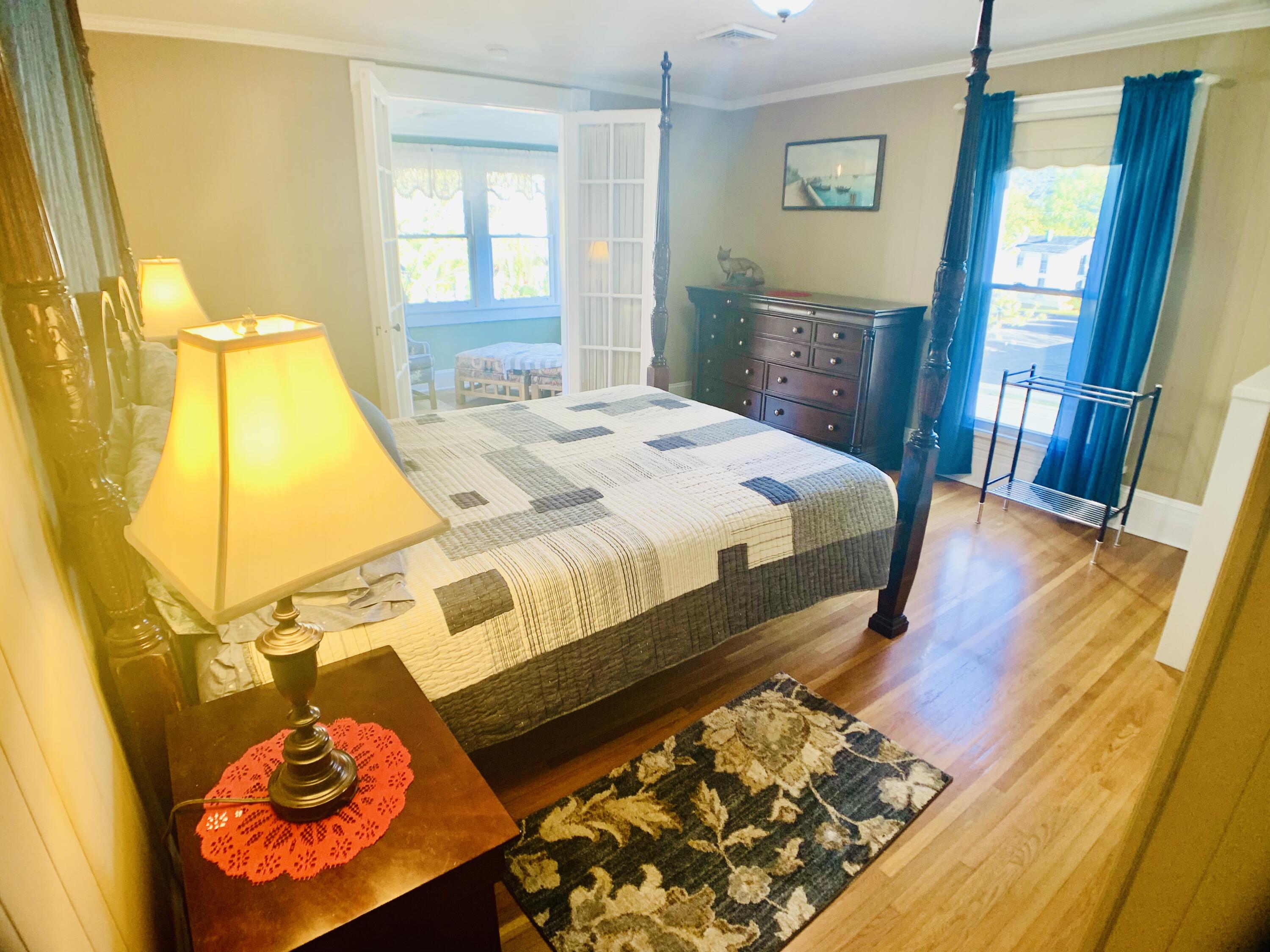 709 McCormick Boulevard Clifton Forge, VA 24422 - Photo 51 of 74 a bedroom with a bed and wooden floor