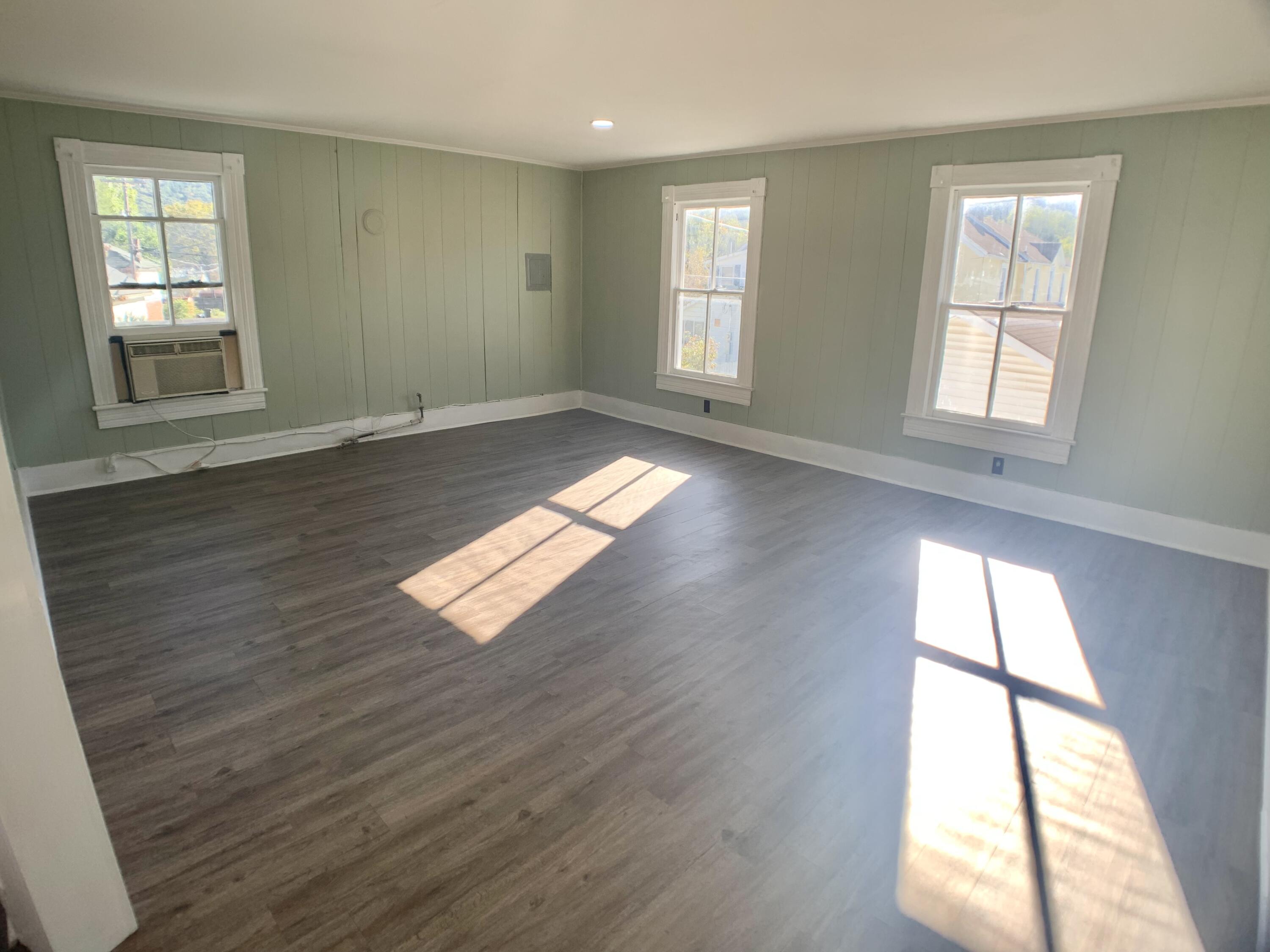 709 McCormick Boulevard Clifton Forge, VA 24422 - Photo 73 of 74 a view of empty room with wooden floor and fan