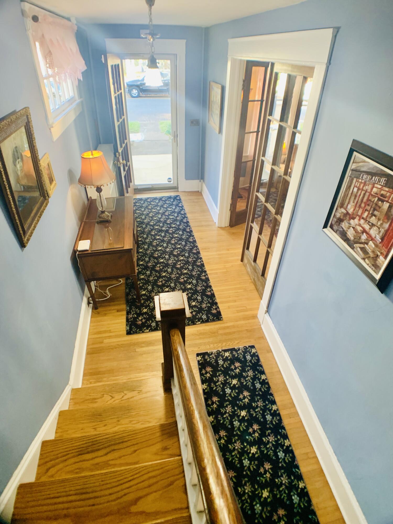 709 McCormick Boulevard Clifton Forge, VA 24422 - Photo 9 of 74 a bedroom with wooden floor bed and a window