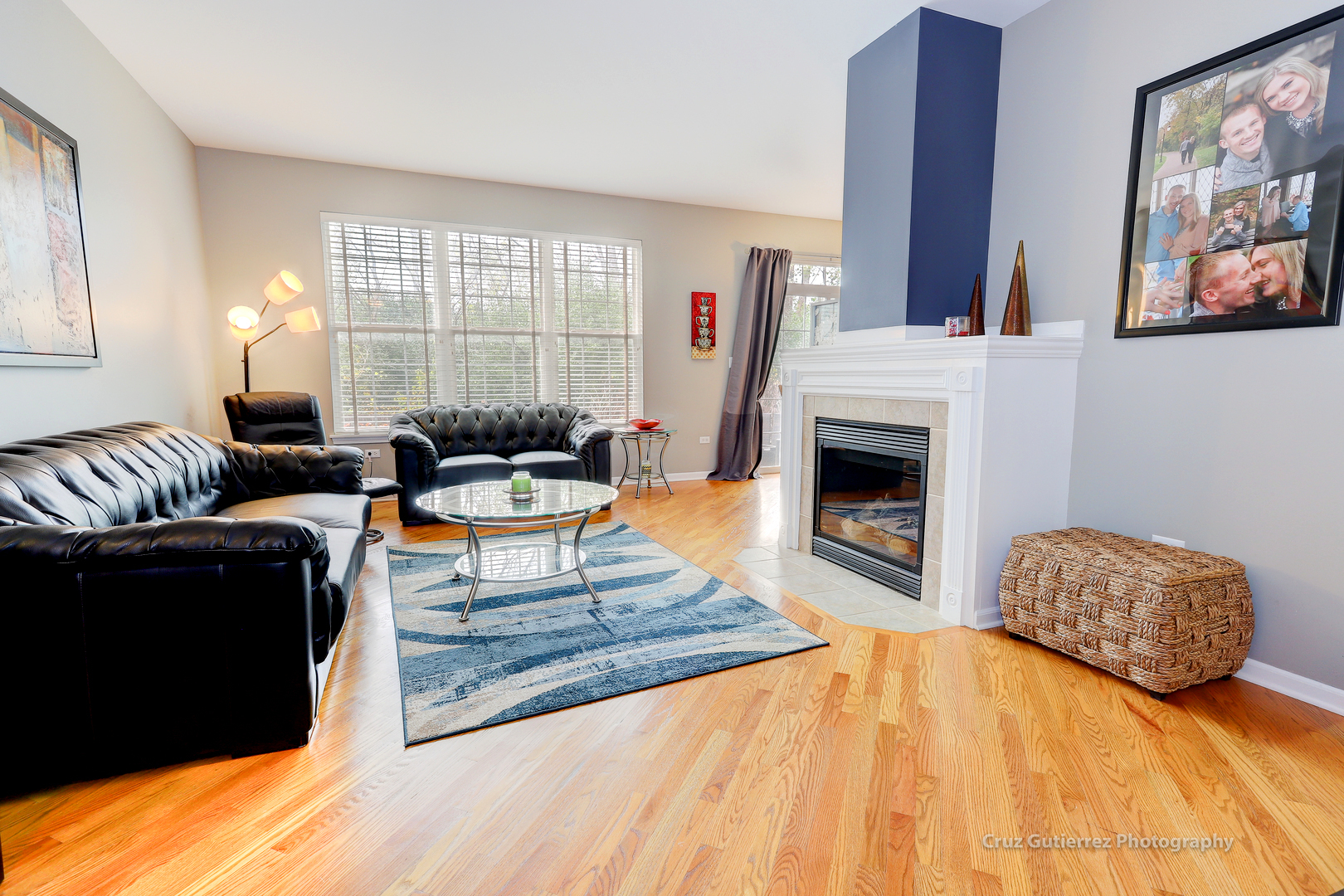 450 North River Road Naperville, IL 60540 - Photo 3 of 26 a living room with furniture and a fireplace