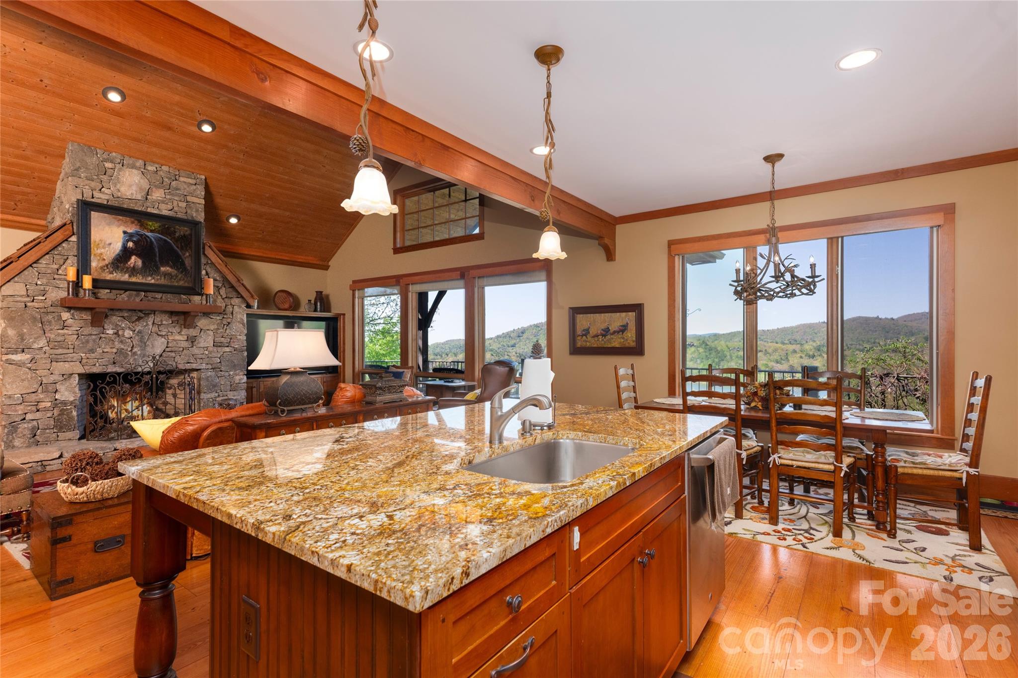 601 Hawk Mountain Road Lake Toxaway, NC 28747 - Photo 11 of 48 a very nice looking dining room with a table and chairs
