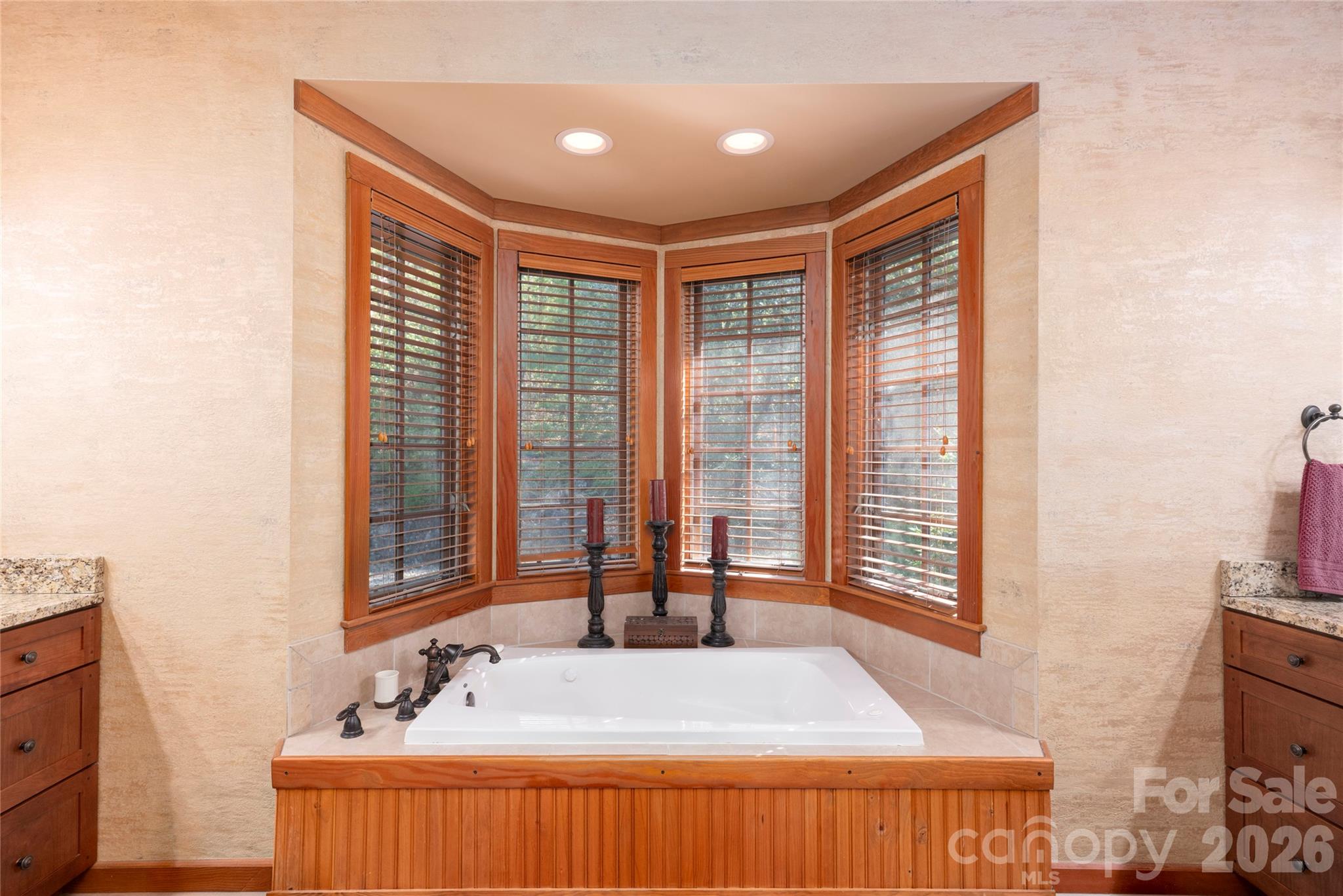 601 Hawk Mountain Road Lake Toxaway, NC 28747 - Photo 18 of 48 a bedroom with a bed and a window