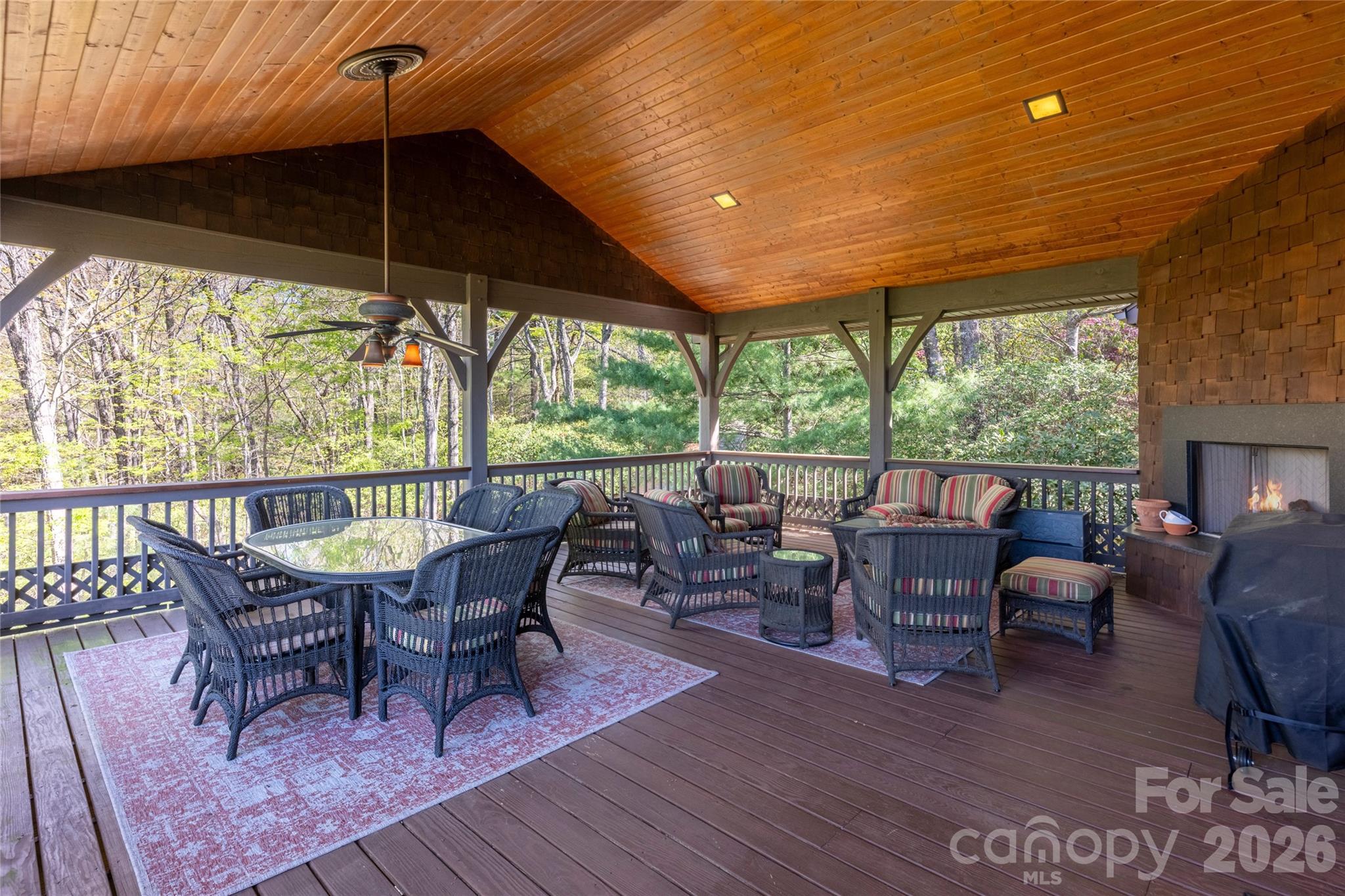 601 Hawk Mountain Road Lake Toxaway, NC 28747 - Photo 22 of 48 a view of a dining room with furniture window and outside view