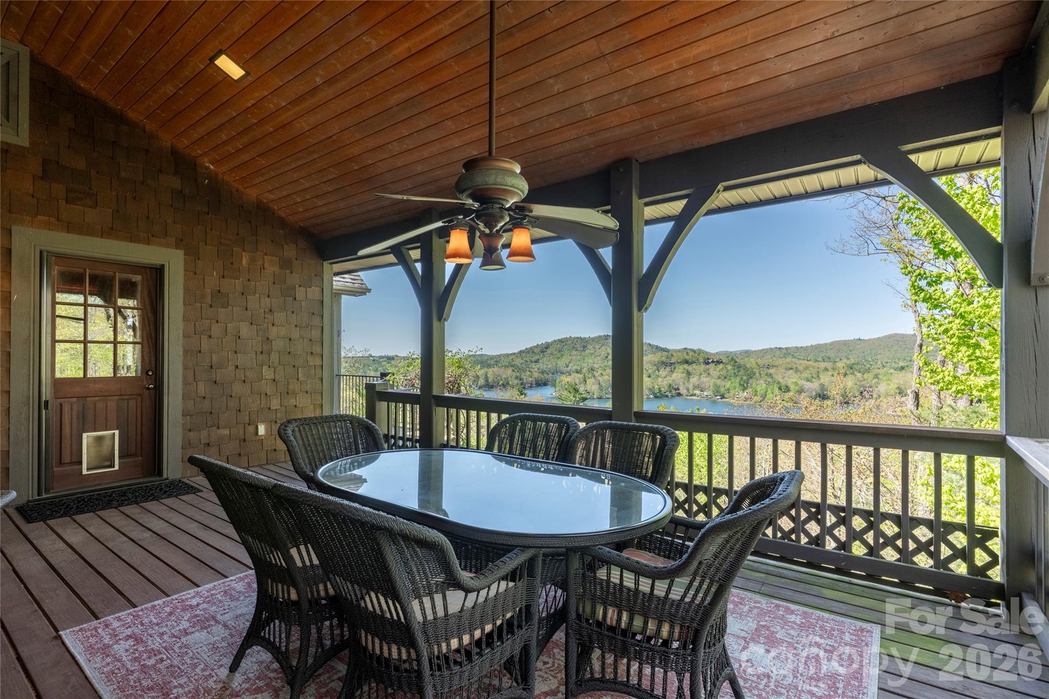 601 Hawk Mountain Road Lake Toxaway, NC 28747 - Photo 25 of 48 a view of a balcony with furniture