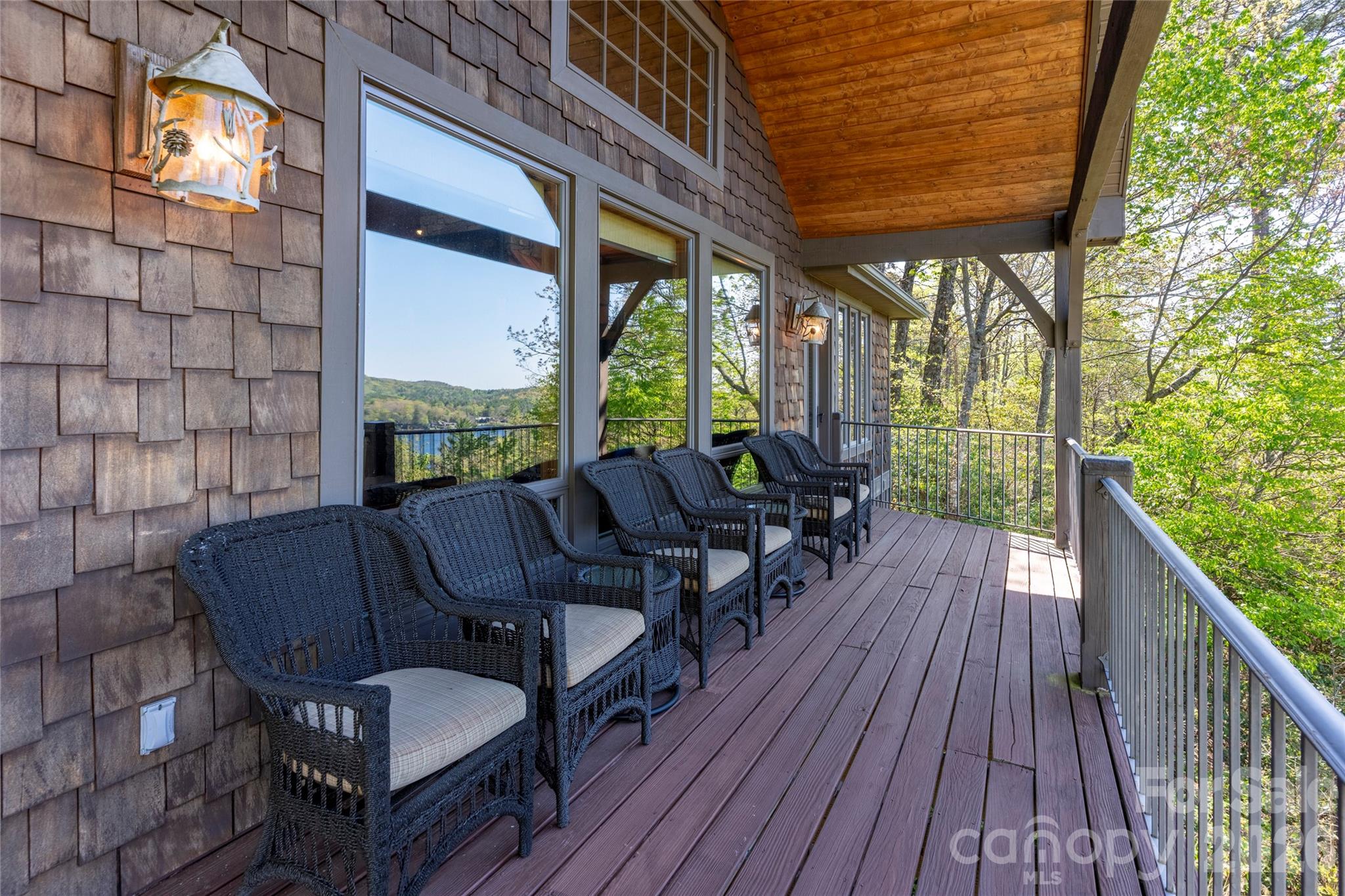 601 Hawk Mountain Road Lake Toxaway, NC 28747 - Photo 28 of 48 a view of balcony with couch and wooden floor