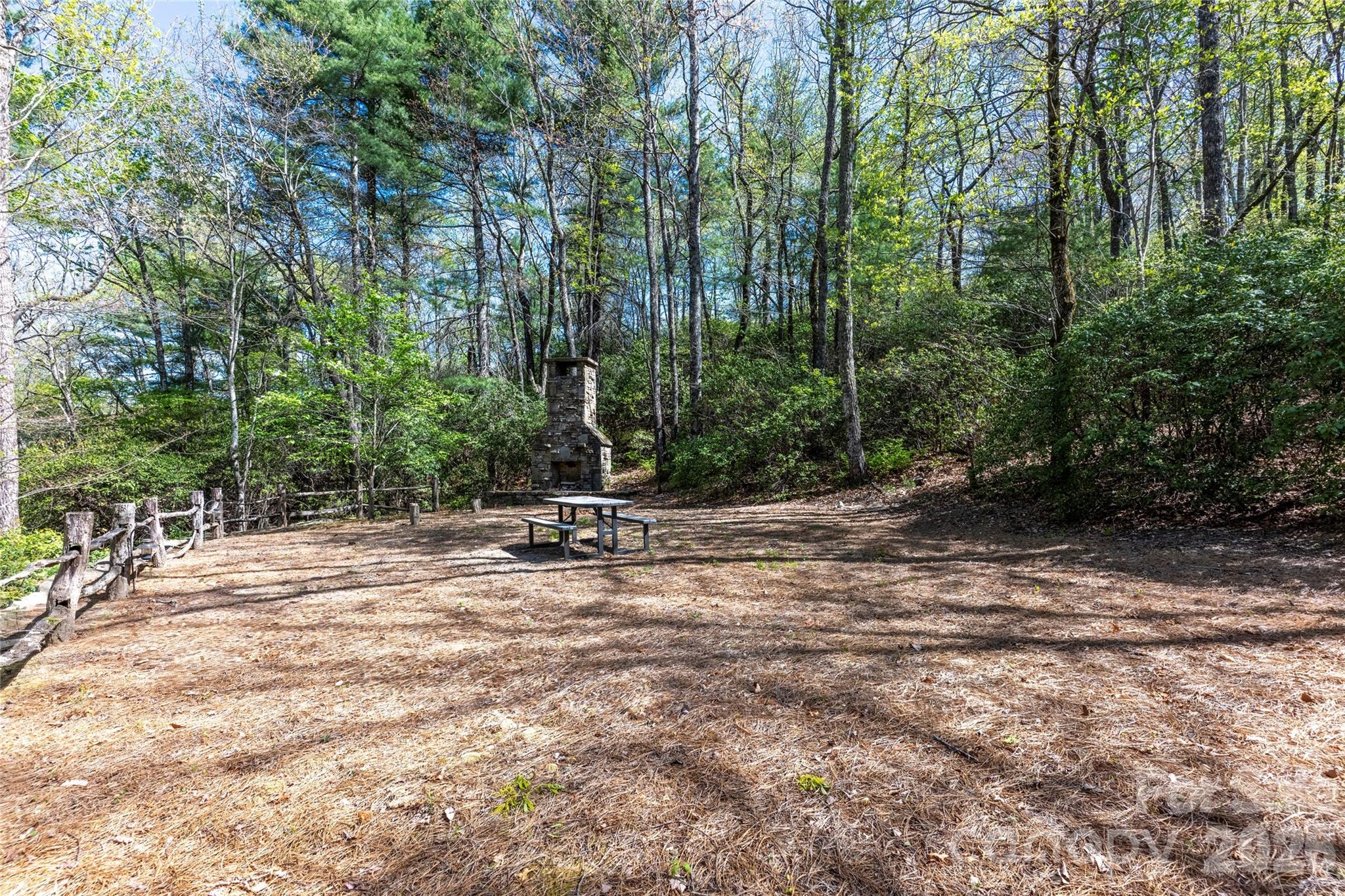 601 Hawk Mountain Road Lake Toxaway, NC 28747 - Photo 44 of 48 a view of a park with a bench