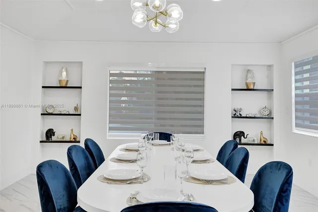 a bedroom with a bed and a ceiling fan