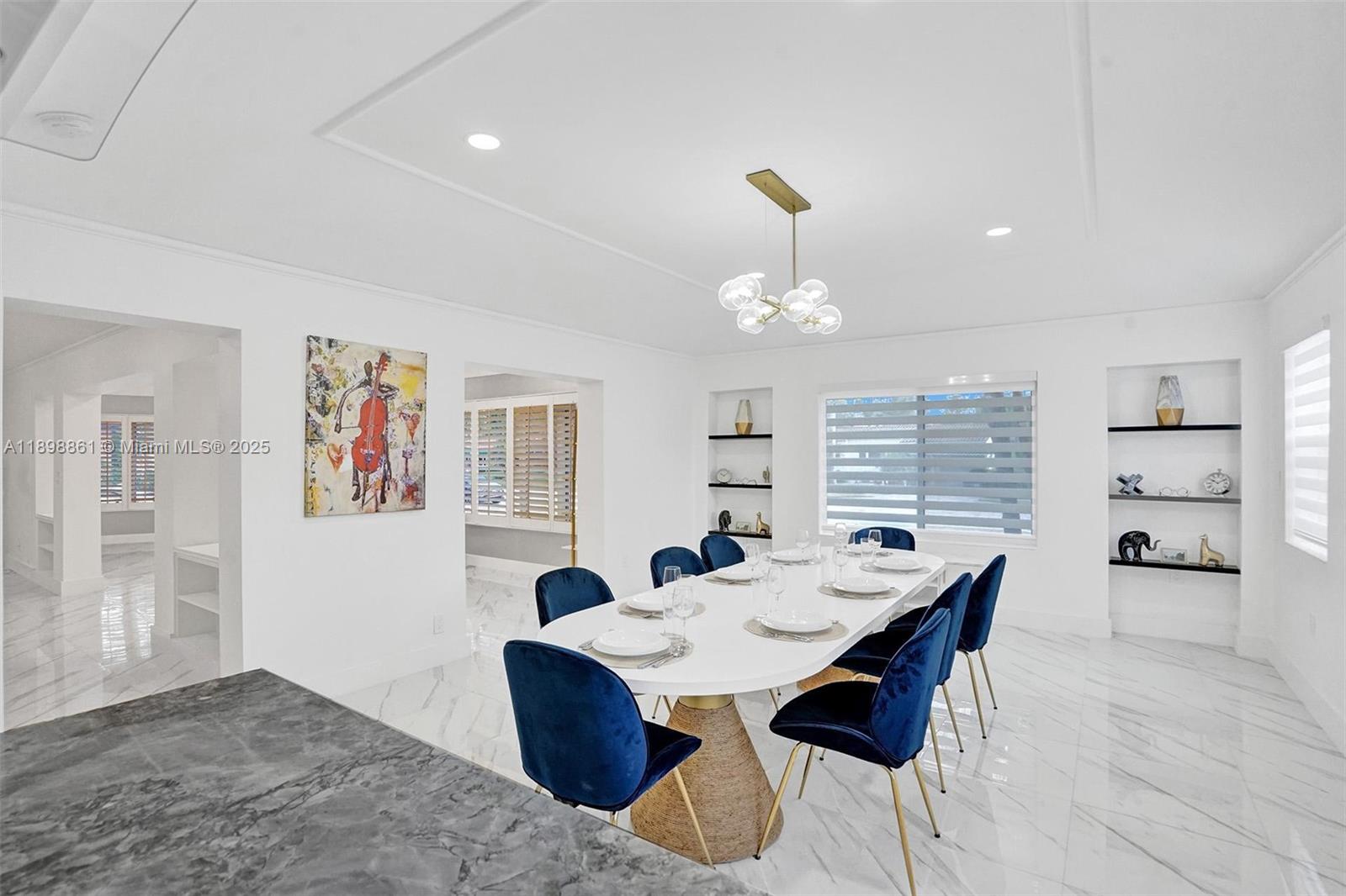 725 Harrison Street Hollywood, FL 33019 - Photo 25 of 91 a view of a dining room with furniture