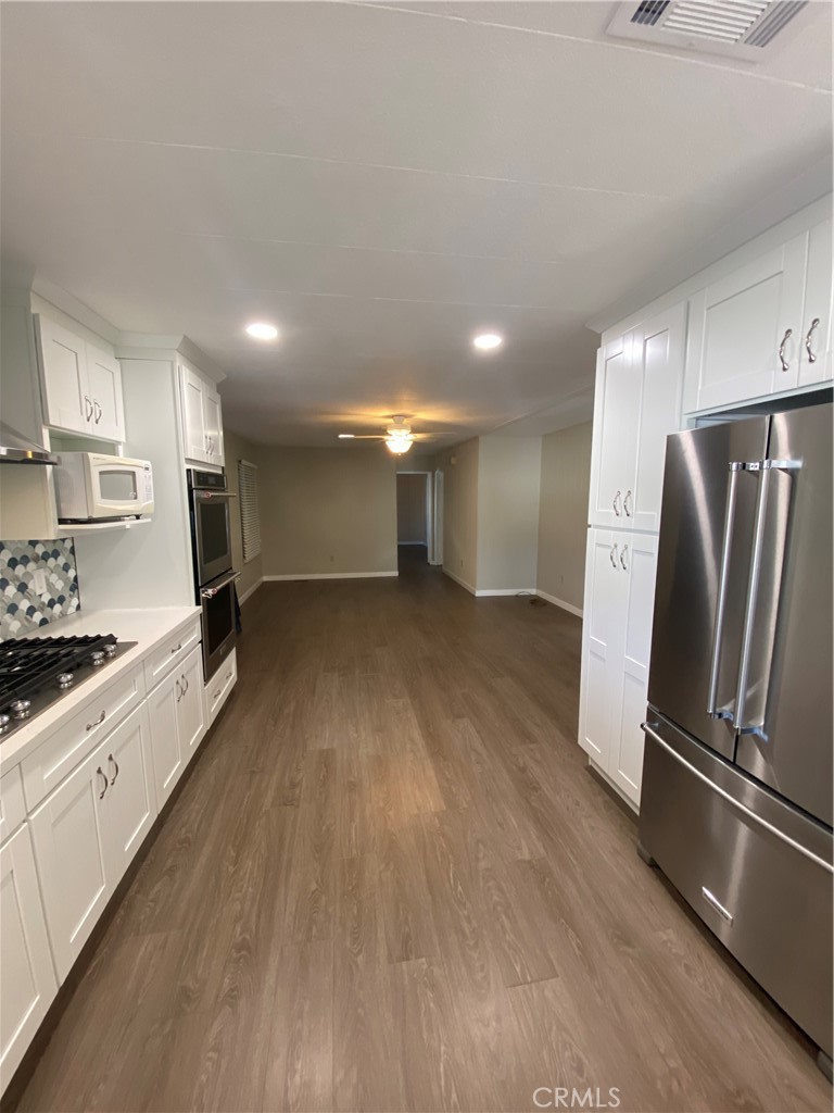 193 Rancho Adolfo Drive Camarillo, CA 93012 - Photo 14 of 43 a kitchen with stainless steel appliances a refrigerator and a sink