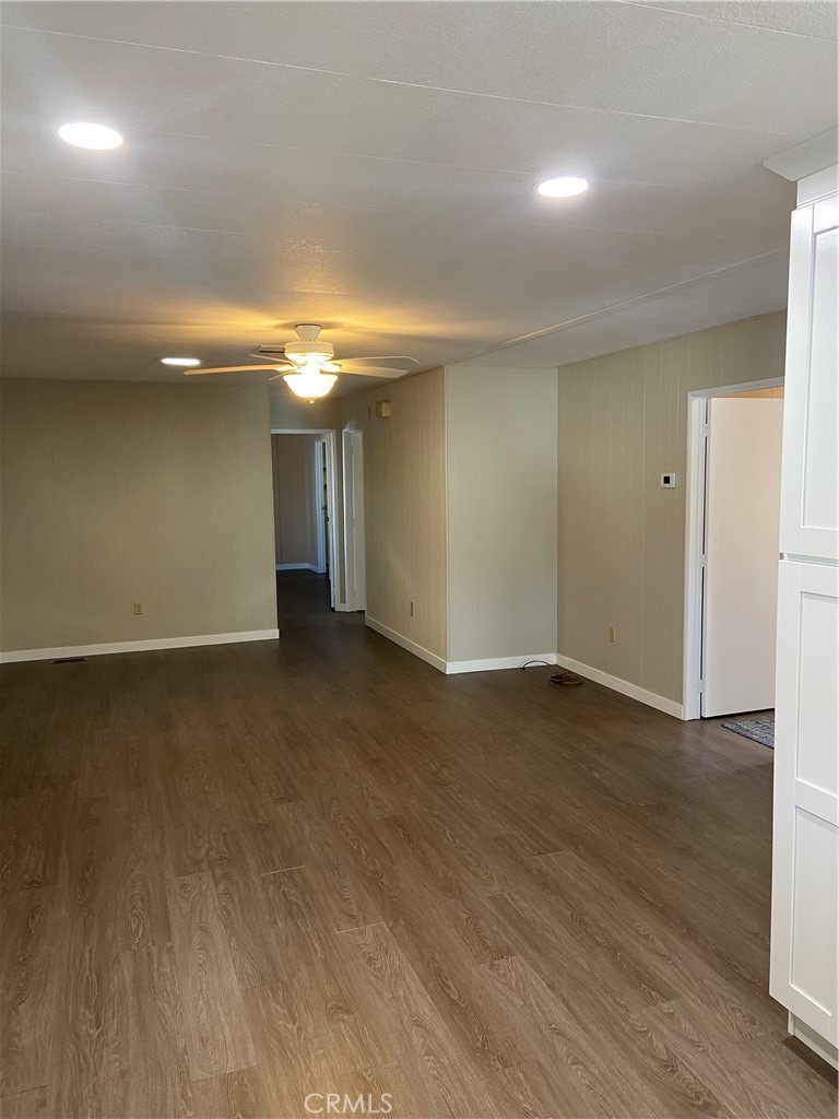 193 Rancho Adolfo Drive Camarillo, CA 93012 - Photo 16 of 43 an empty room with wooden floor and windows